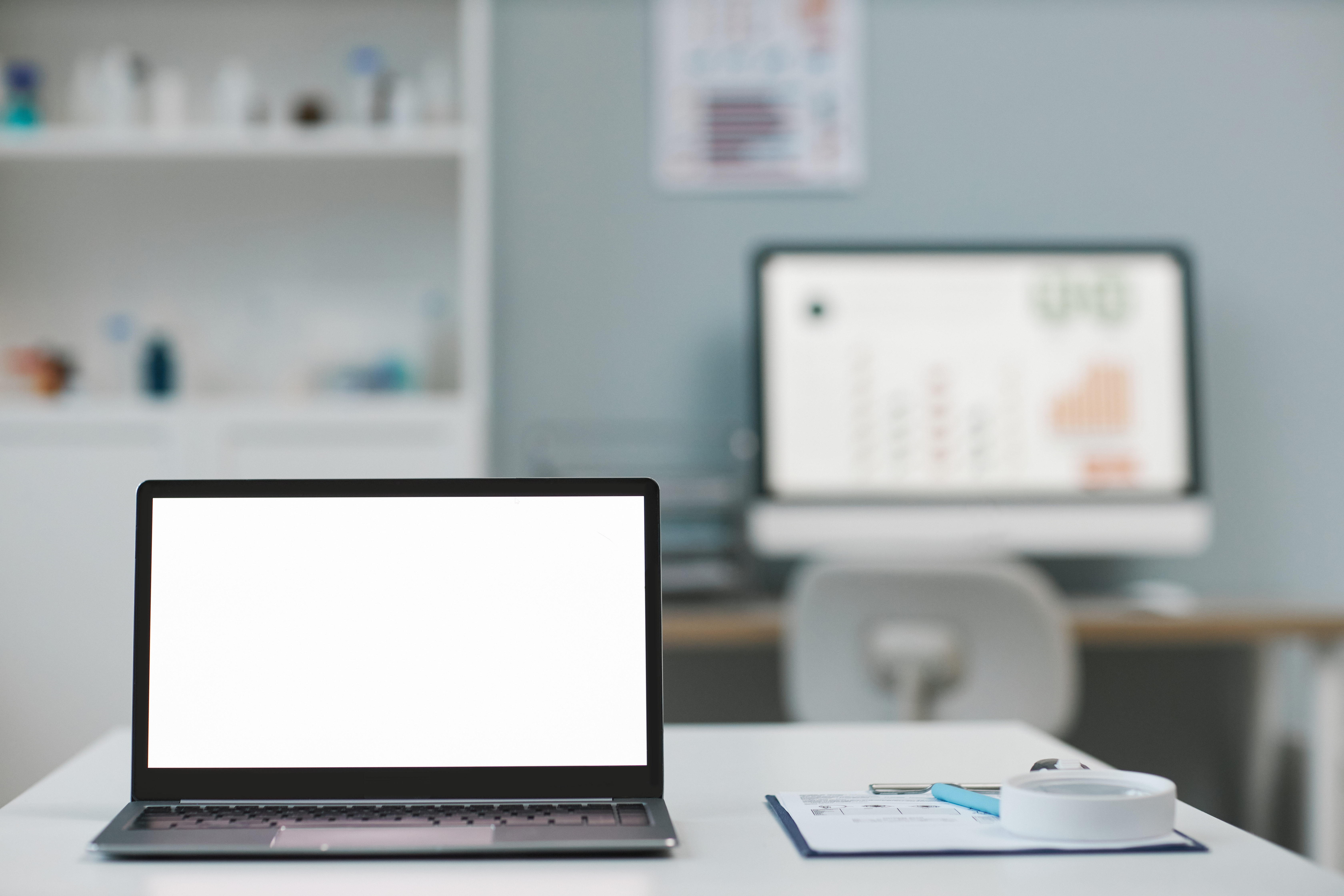 Why a Custom Healthcare Website Is Critical for Business Growth 1 - MedWell Digital Marketing Agency laptop with blank white screen standing on desk ag 66cbef22719ecb1ccfc8 - MedWell Digital Marketing Agency