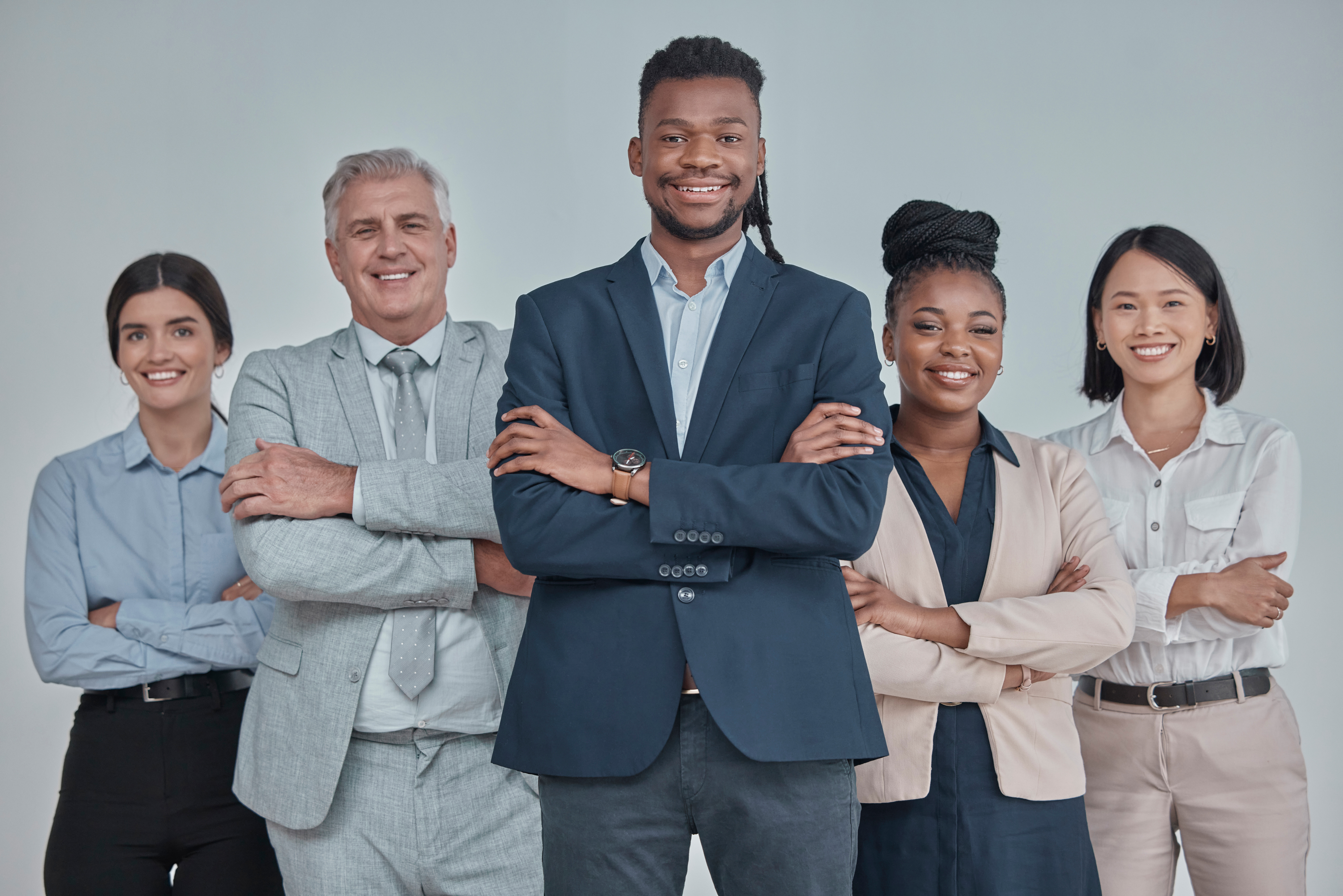 leadership team and business people with crossed 03fe12d6a1a008542e20