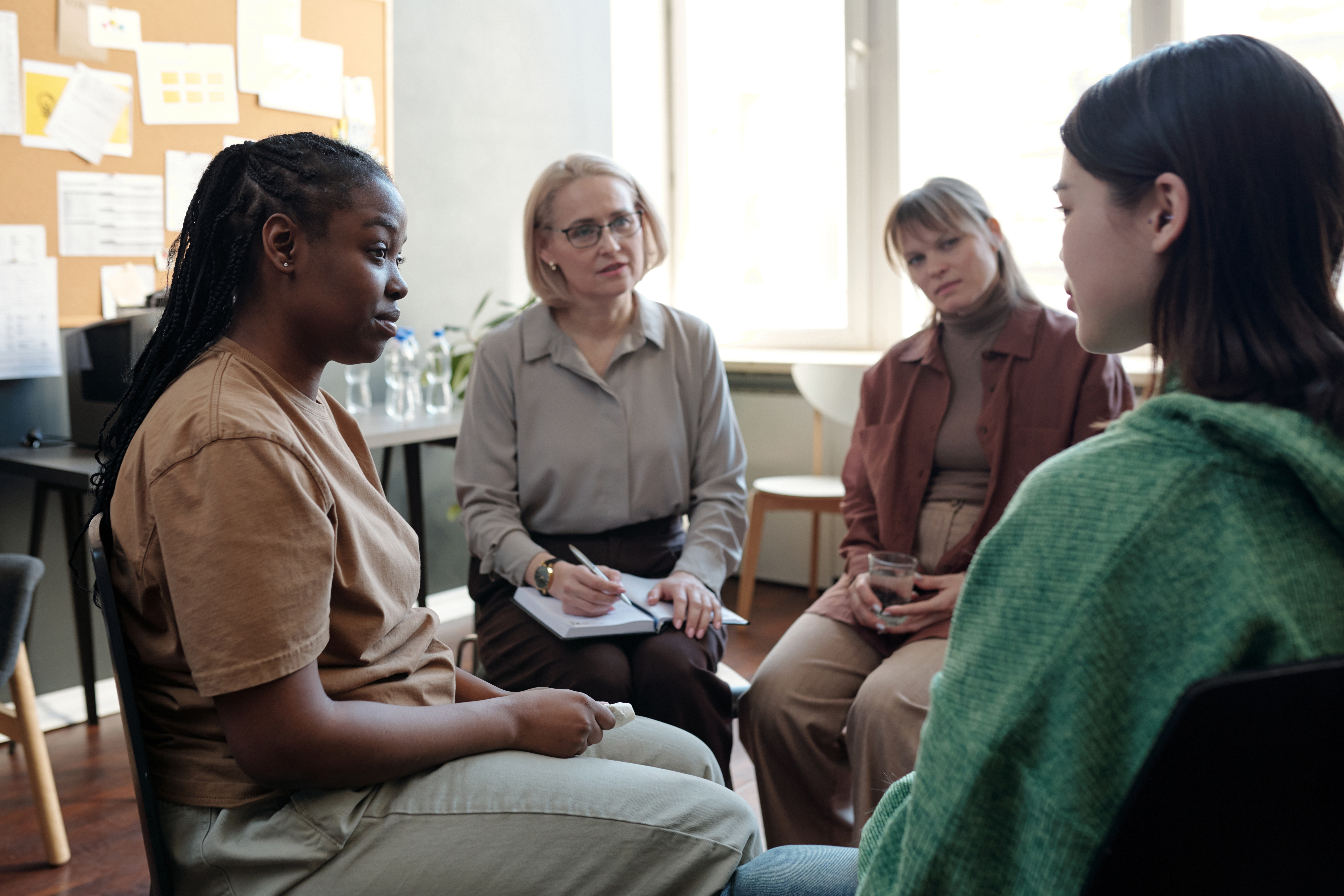 listening to female patient story 8bc7eec7a4047cb98afc