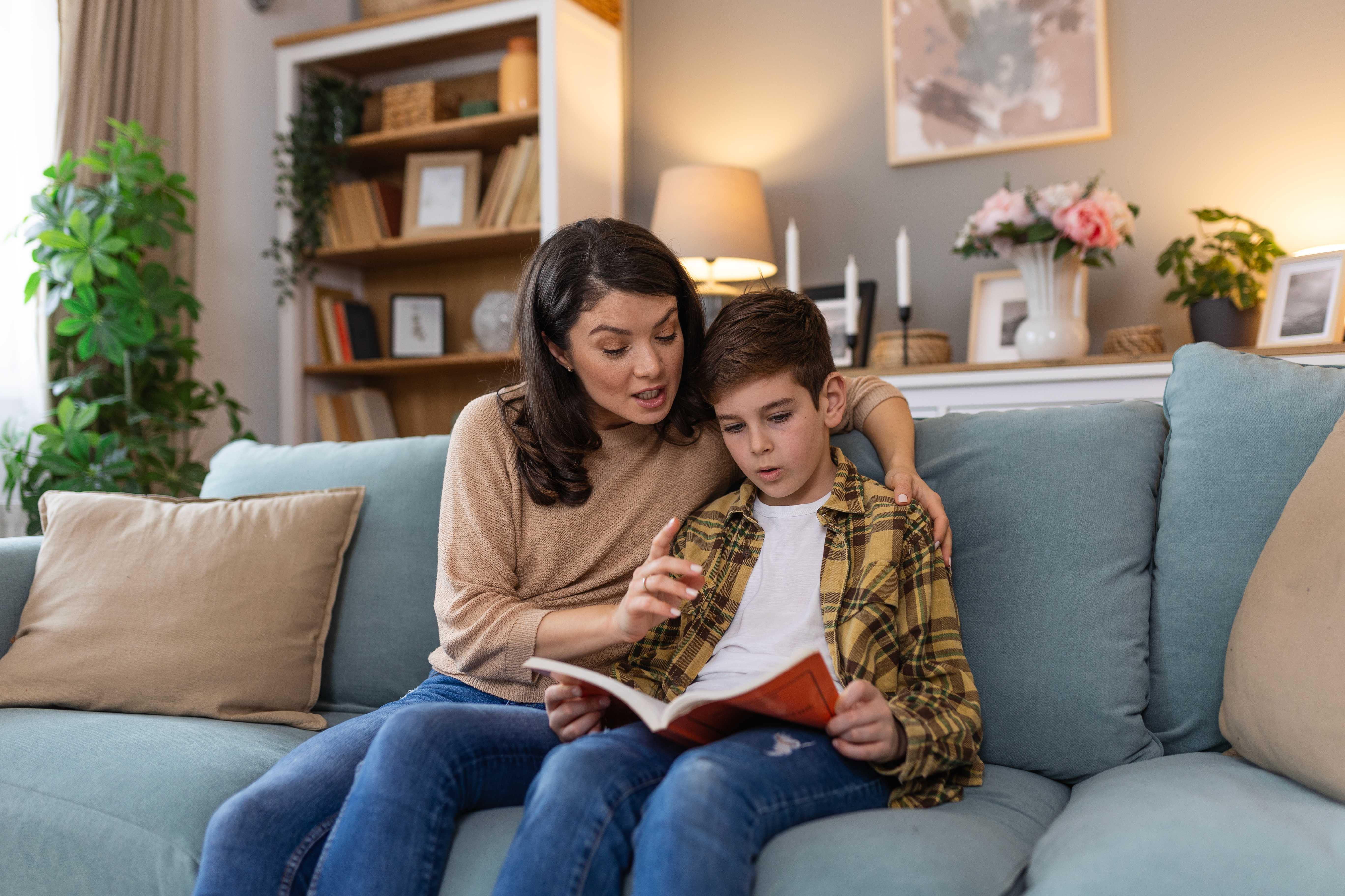 Loving Young Mother Reading Book To Adorable Littl D4574e731bb2d57338d2