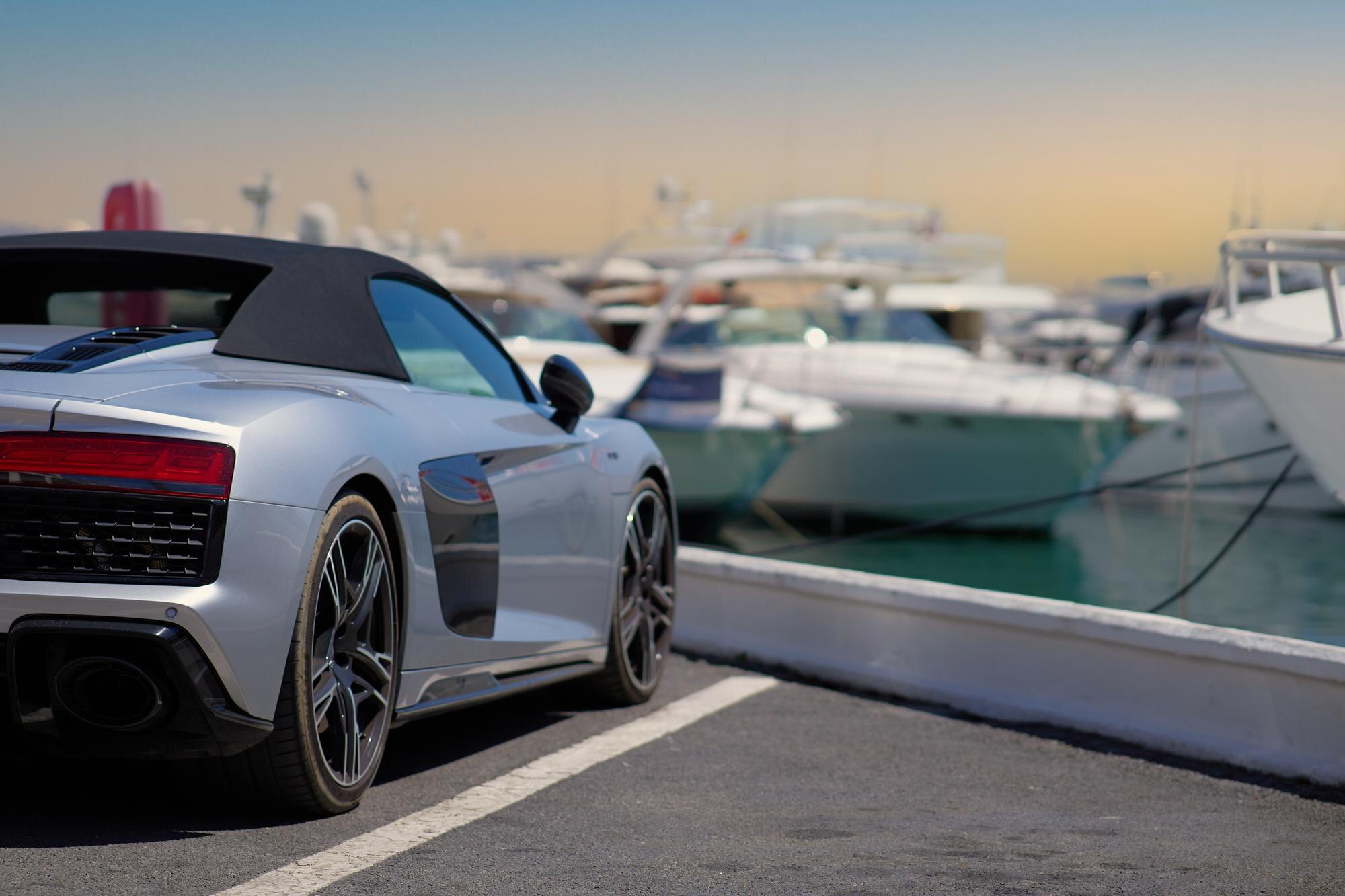 Car4Rent - luxury sports car on the background of yachts 39a66fa60b9e84f21089