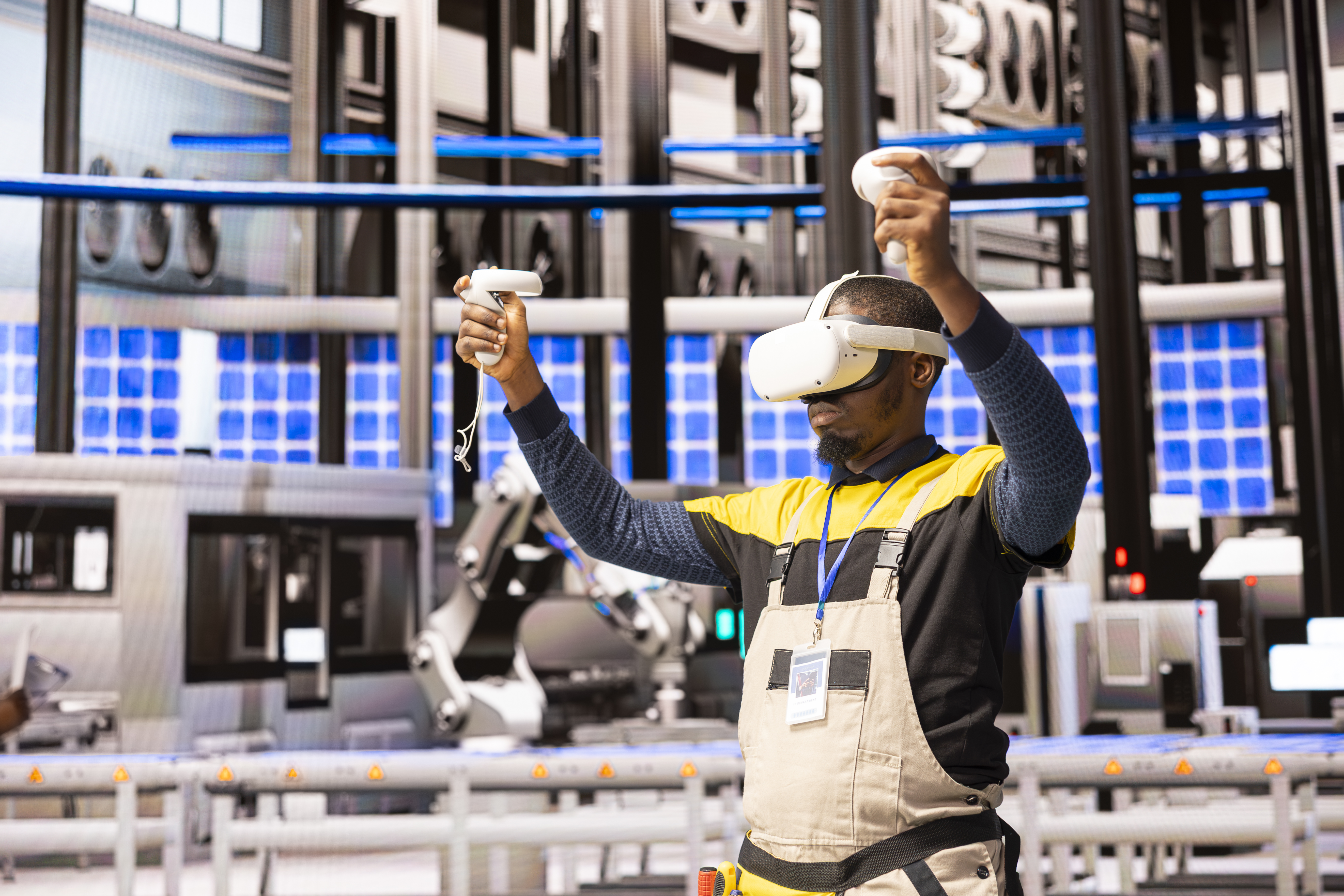 male engineer monitoring automated factory with vi b5932aa1a89ff9831914