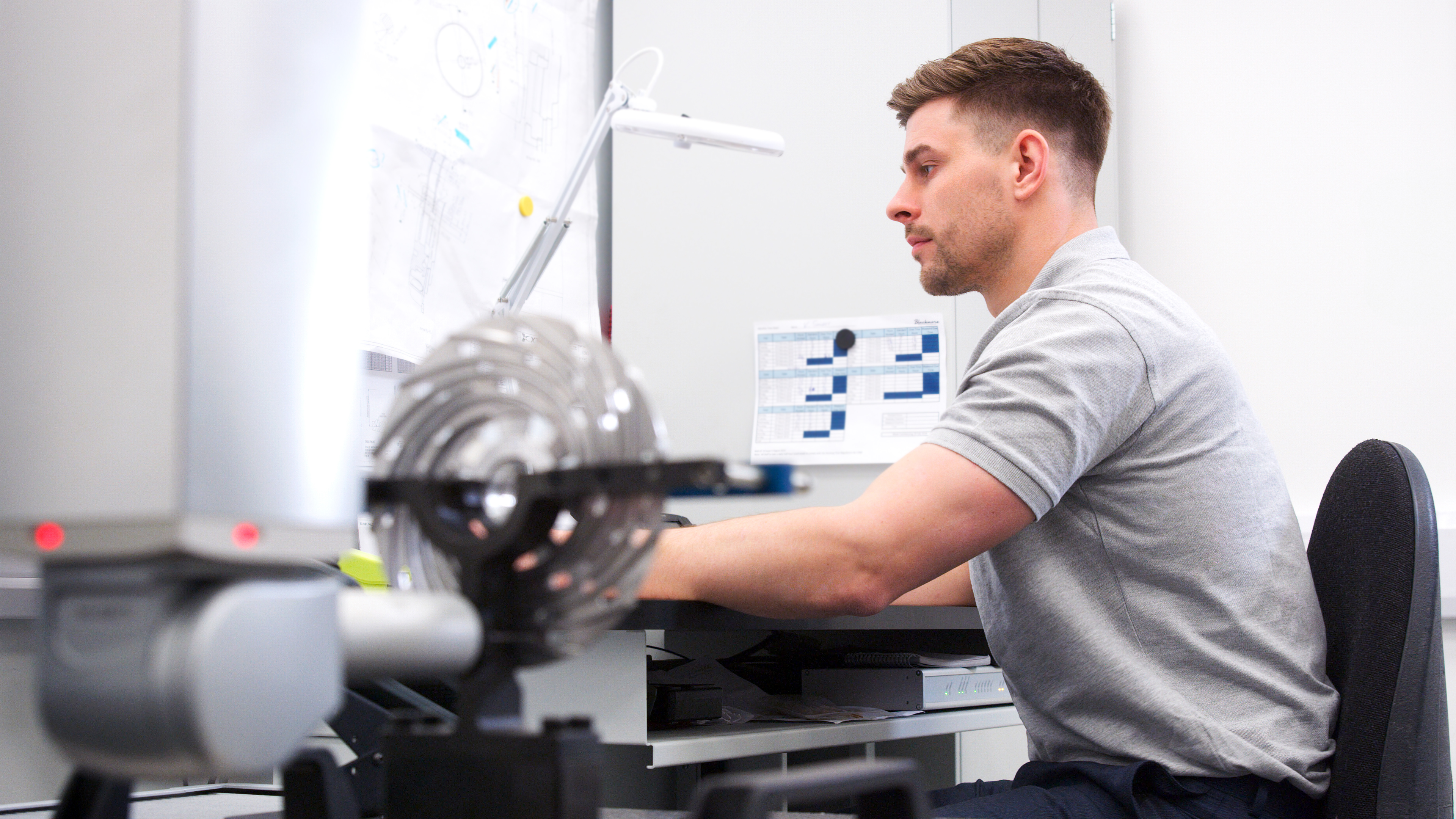 Why Local Plastic Production Delivers Better Quality and Faster Turnarounds in Australia 1 male engineer uses cmm coordinate measuring machin 13b6e0f668f797760a08