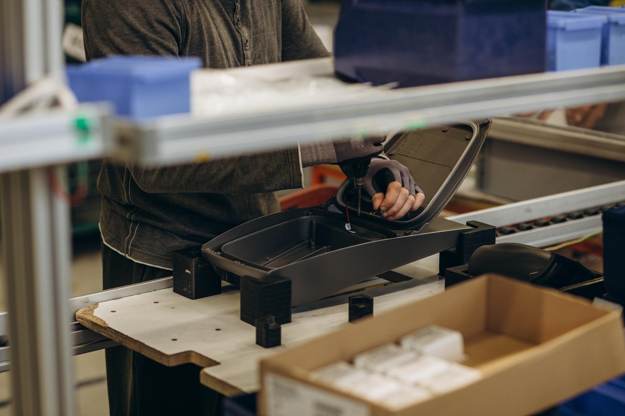 Why choosing a local plastic supplier cuts lead times and lifts quality control 1 male hands work in a street lighting factory a42c155e56614e952969