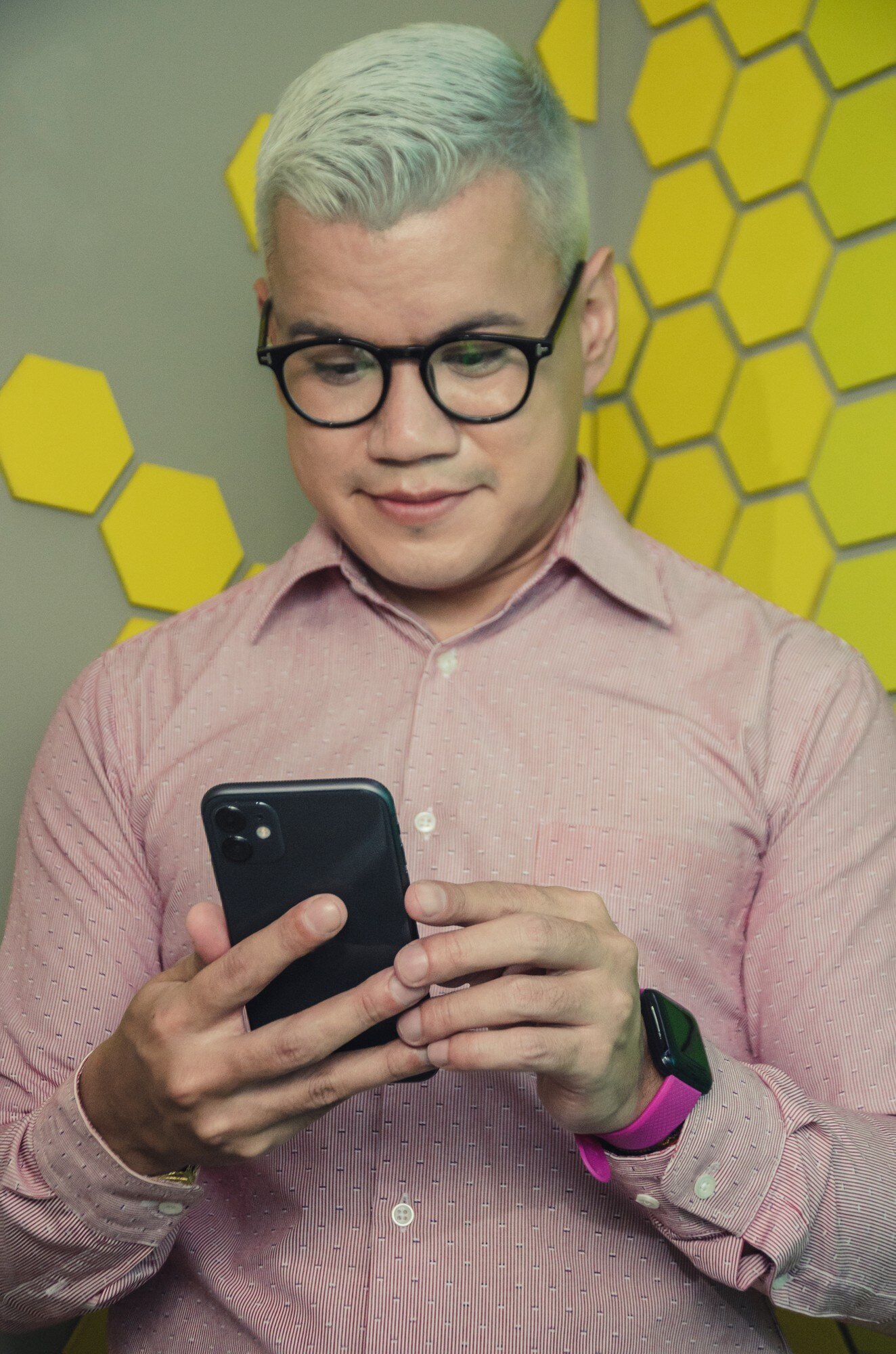 man checking cell phone ae0bfbca566a1c3d438a
