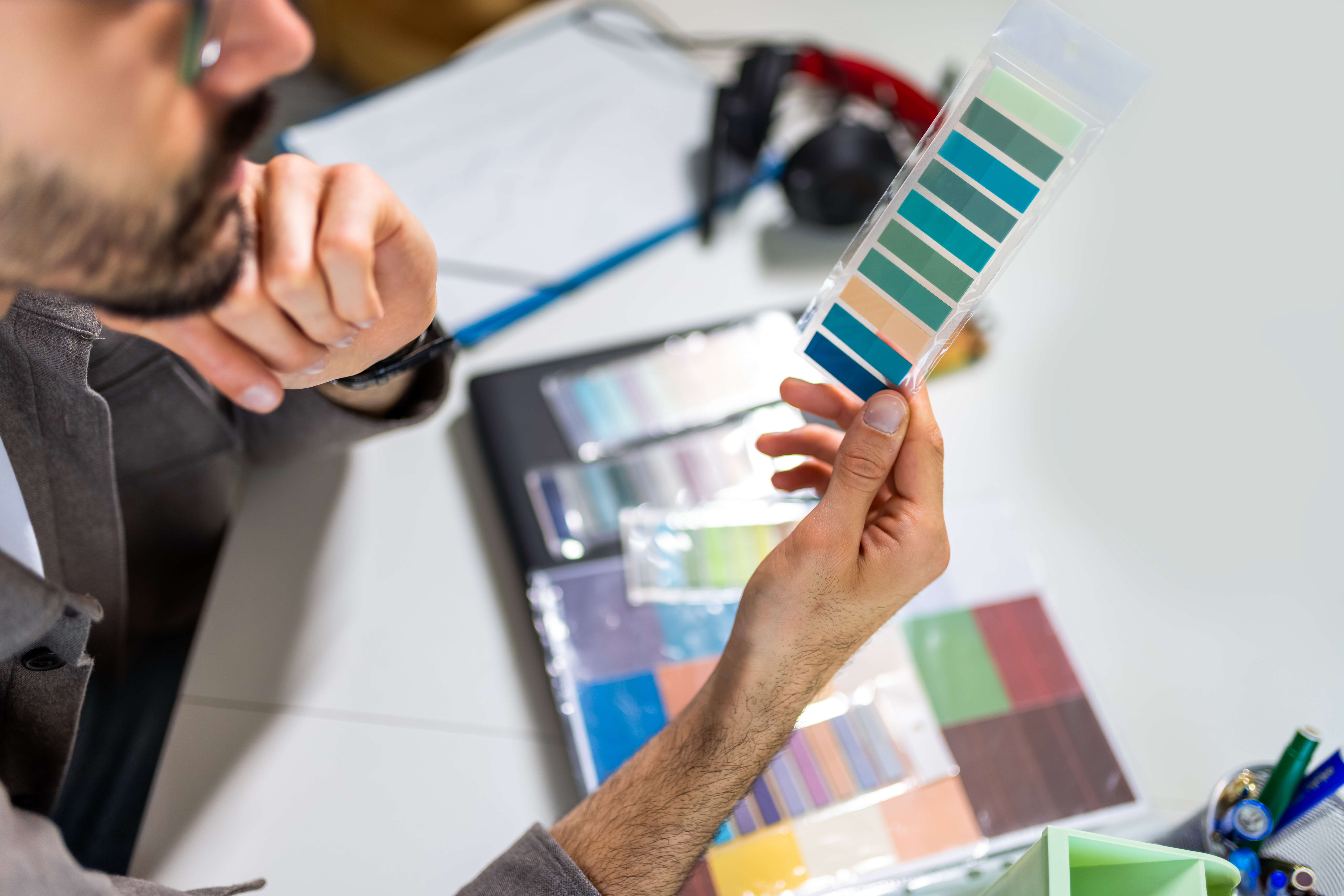 Avoid common mistakes when ordering custom plastics online: a practical Aussie checklist 3 man selecting the perfect color from a palette for 69cac55b1414c5ae1b59