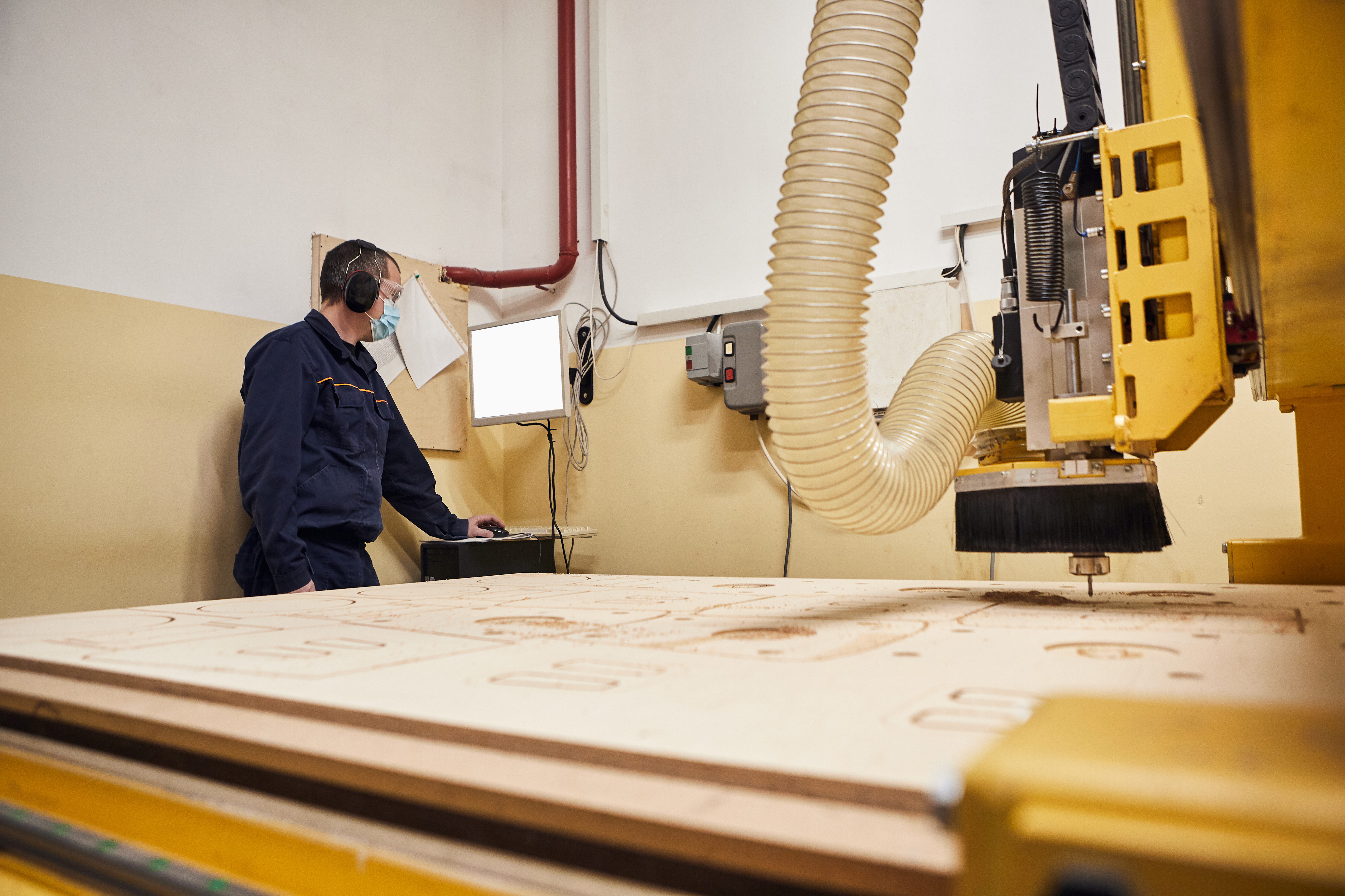 man work in the wooden cnc machine device with nu bac149b06784bb7c7025 | Perspex Online