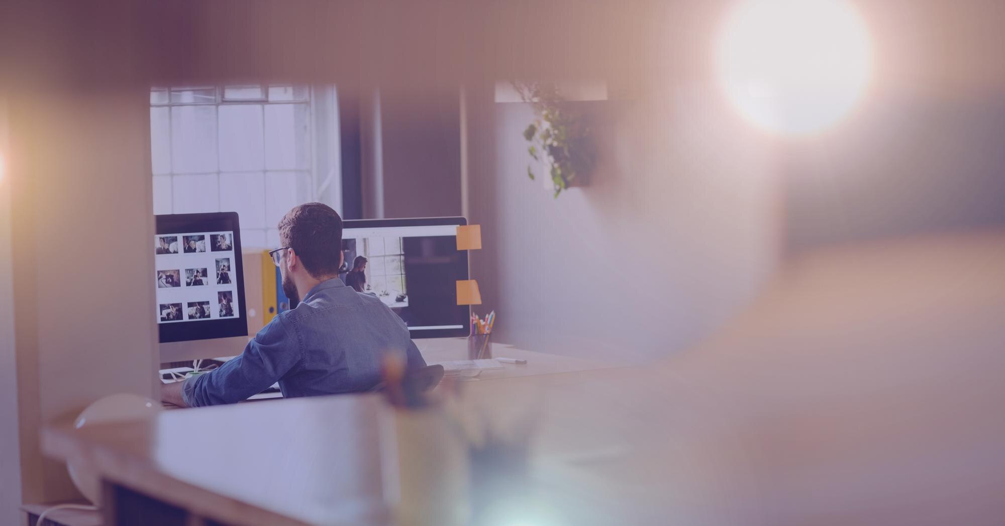 Is Your Website Boring? Let's Turn It Into a Digital Powerhouse! 38 man working in hazy glow room ec170c6b11b2d94156c7