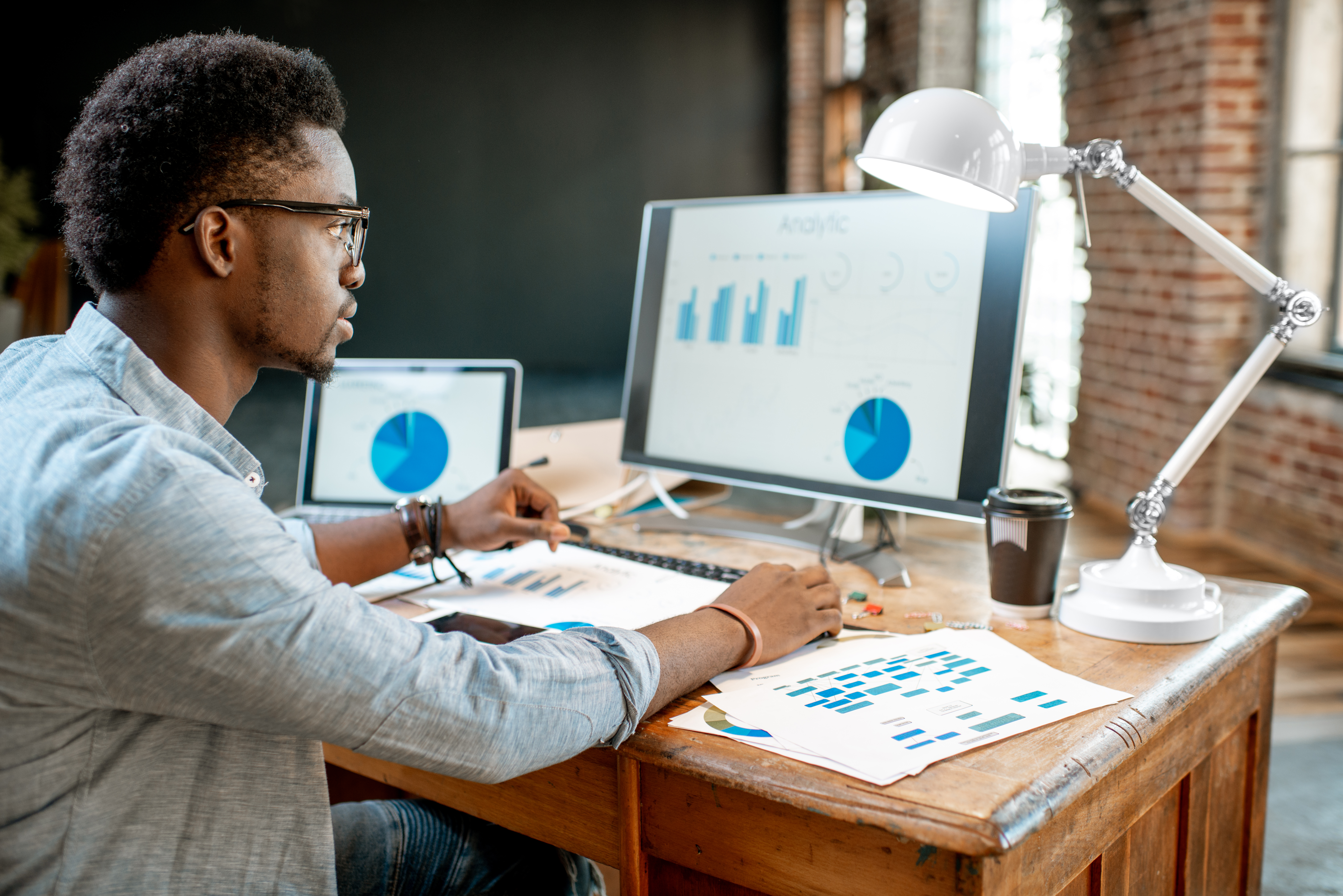 man working with analytics at the office eacc0b7a2bde92a5ab15