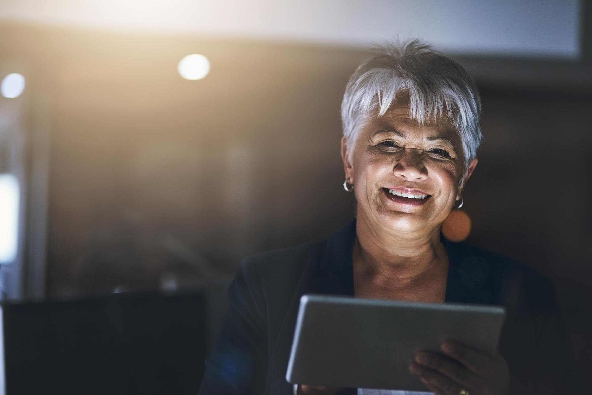 mature business woman and tablet in portrait at ni cd788715340c9abbc639