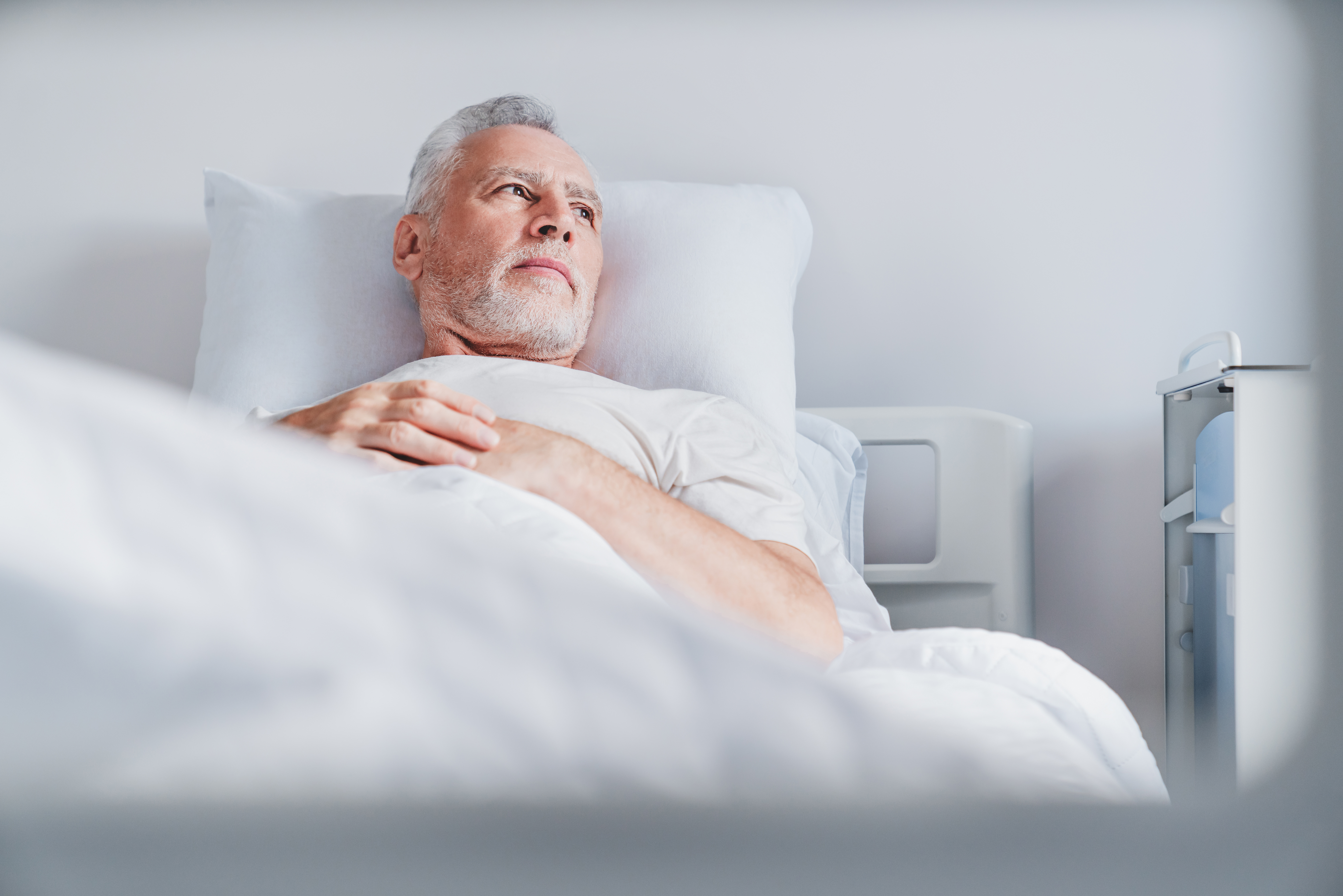 mature caucasian male patient resting while lying 4500a206ad11e16166ba