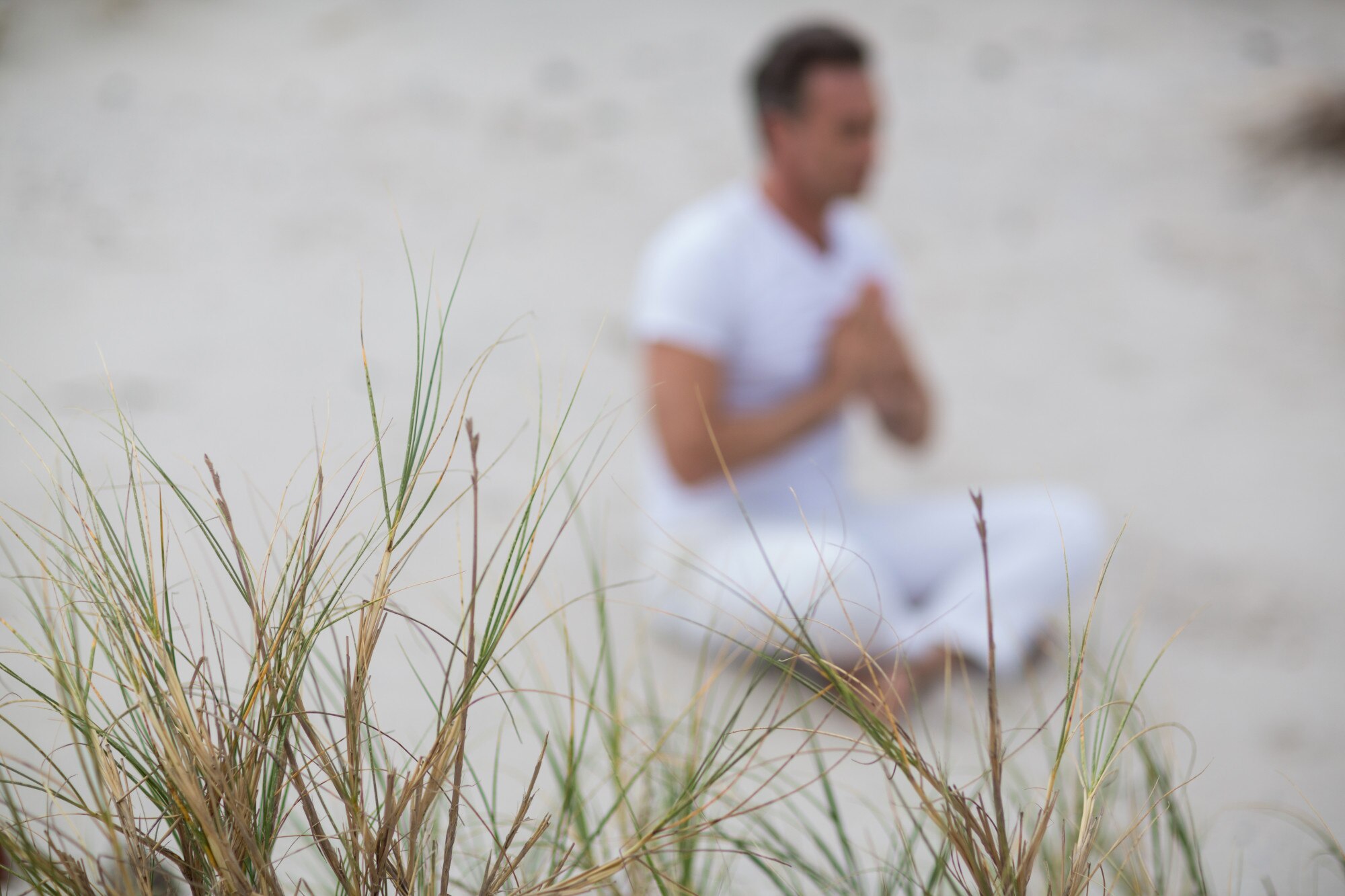 mature man doing meditation 40569a7aadeb50c328d0