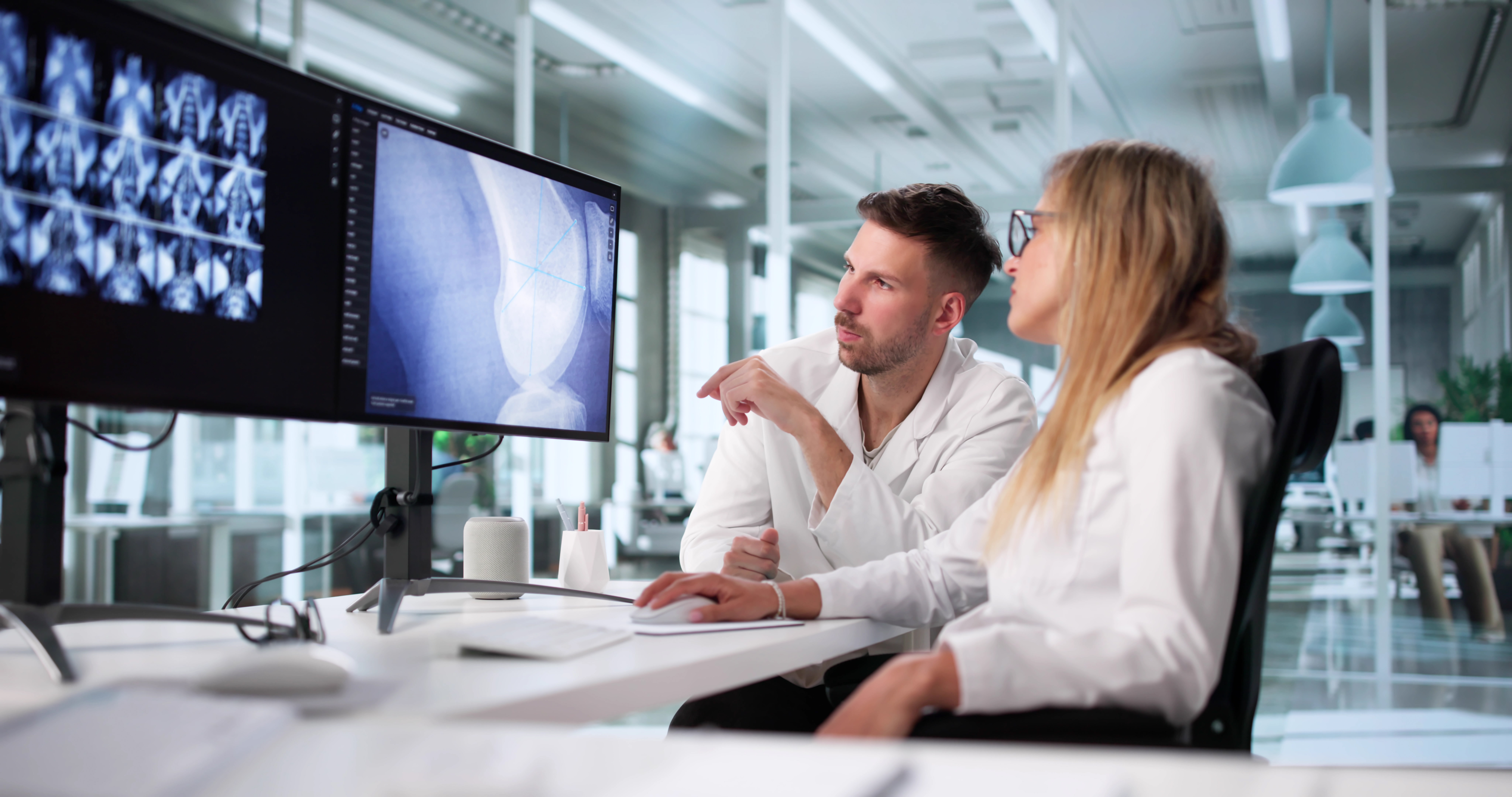 Radiologists reviewing patient scans