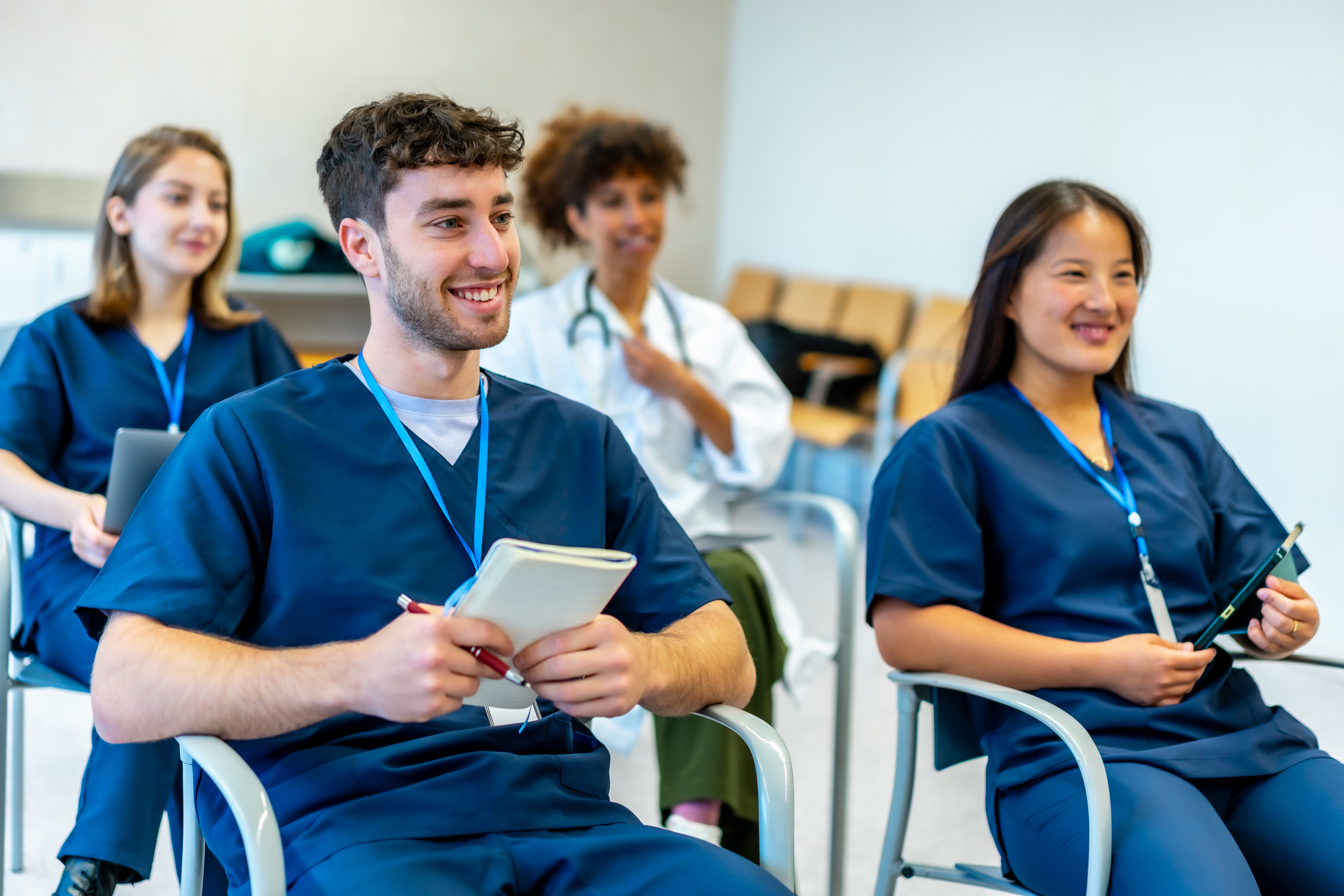 Unlock Your Global Medical Career: The Benefits Of Expert-Led Oet Preparation For International Medical Graduates 2 image of a group of medical workers in a classroom - illustrating article on OET and medical career - #The best OET Preparation course