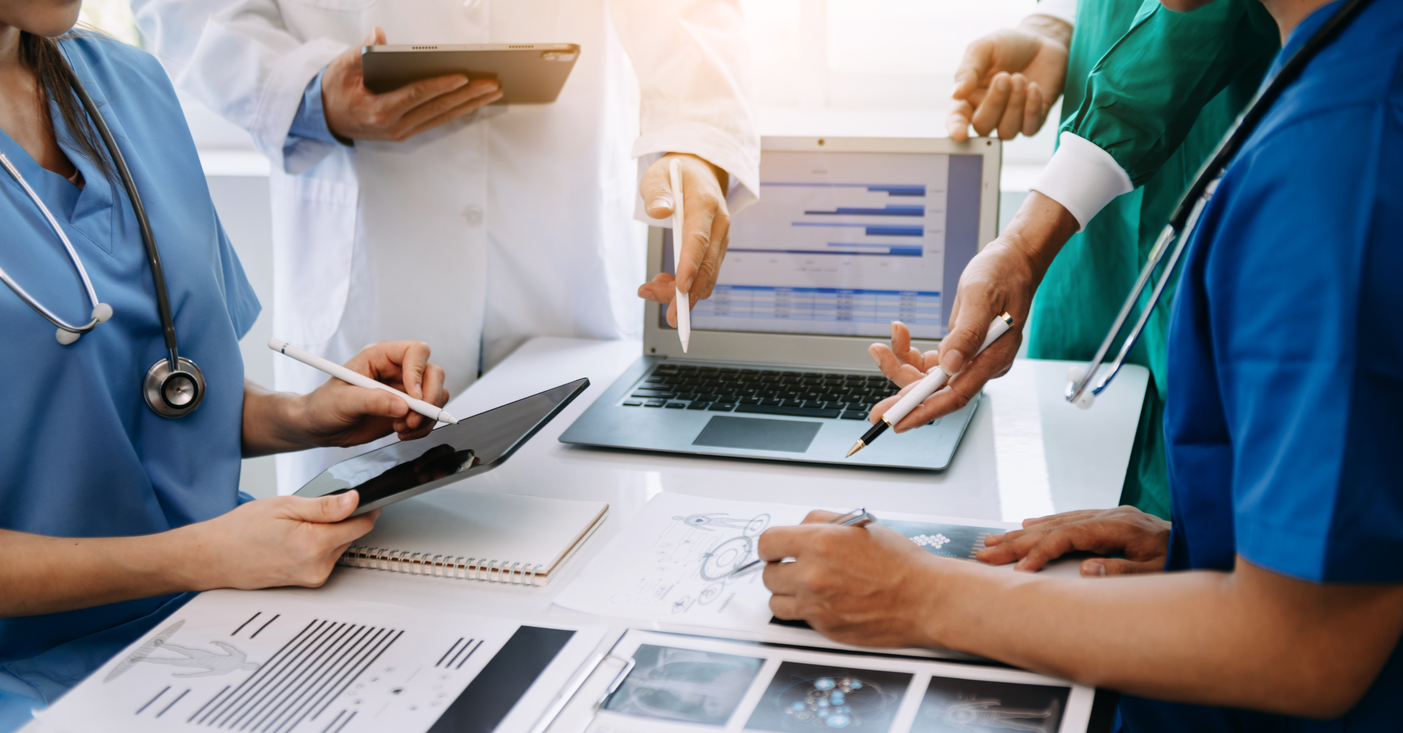 Medical professionals discussing how to streamline their practice 