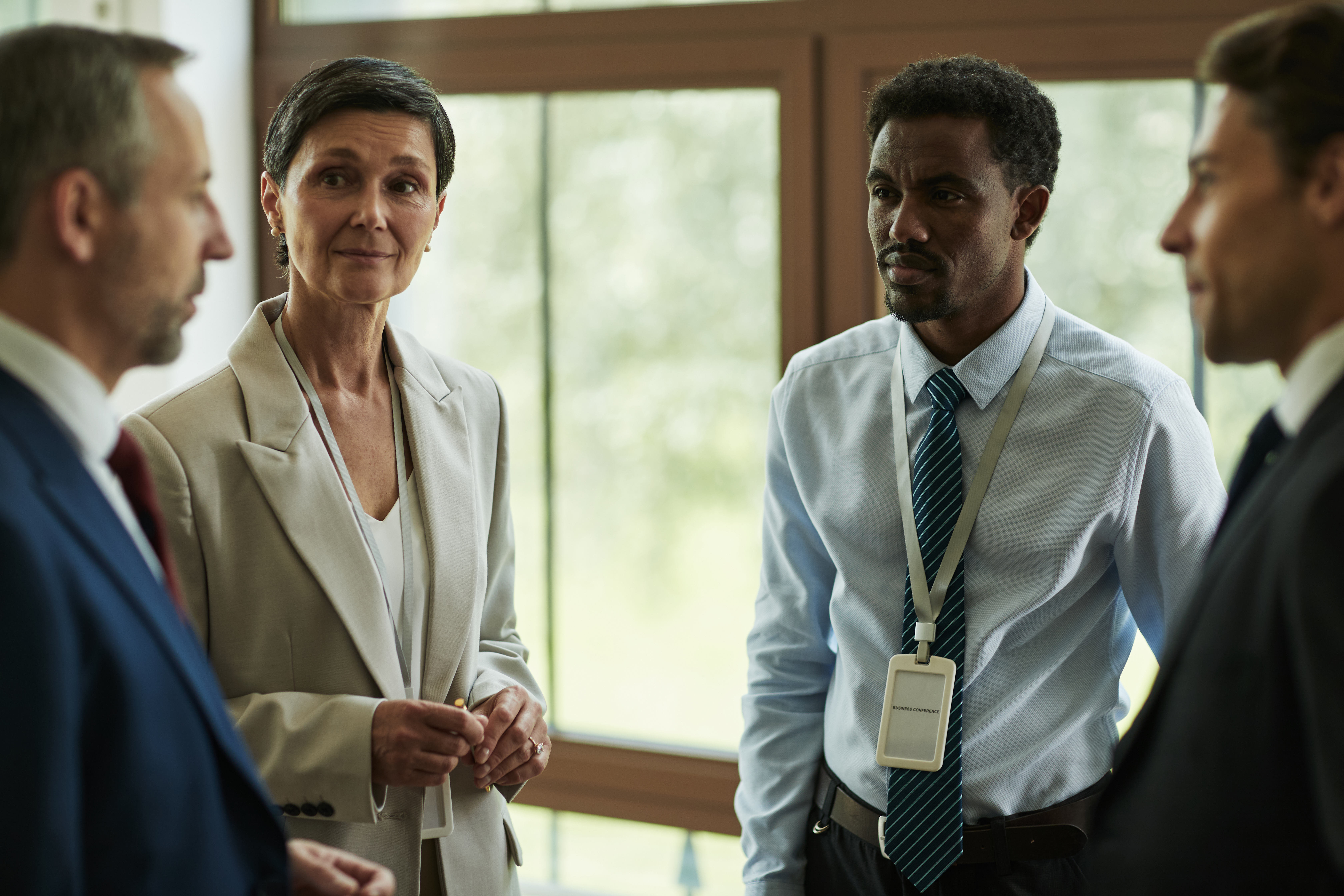 middle aged caucasian woman and diverse colleagues 14a696a2832d044ff033