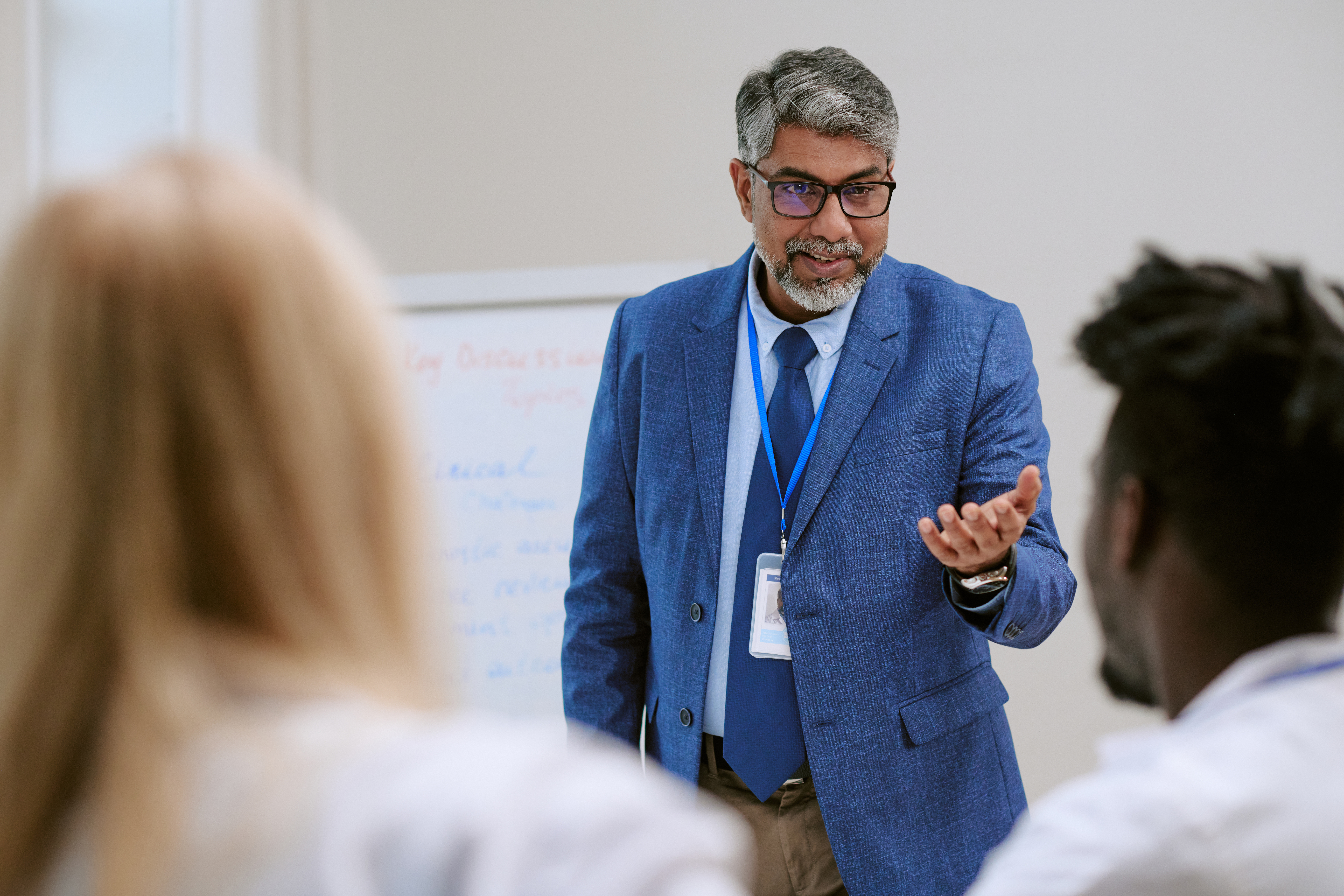 Geopolitics and Energy Security: A Must-Know for Today's Professionals 3 middle aged south asian man explaining concept to 4426d6fed4eabae82d53