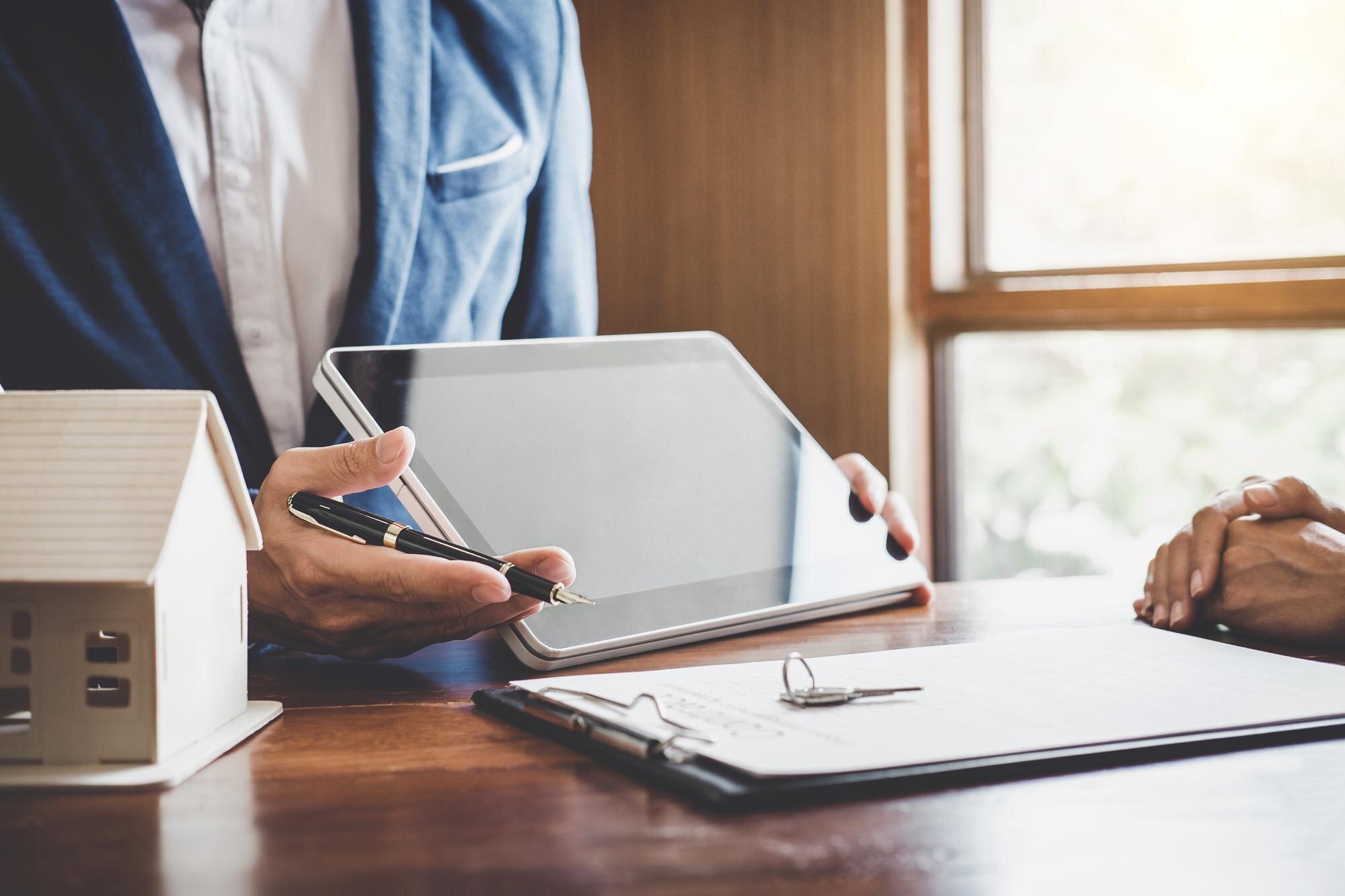 Inspector reviewing report with client