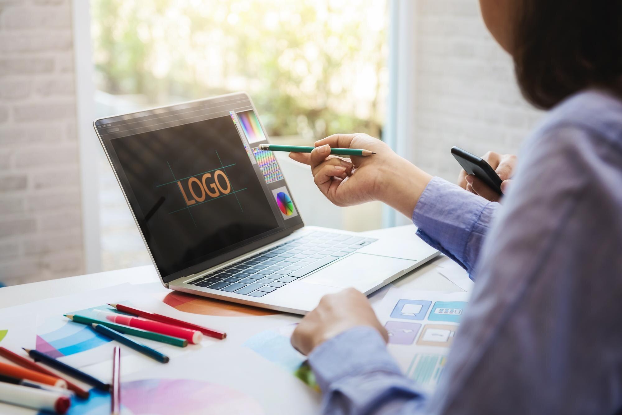 midsection of design professionals working on tabl 3d4cf4e02aa31f346ac5