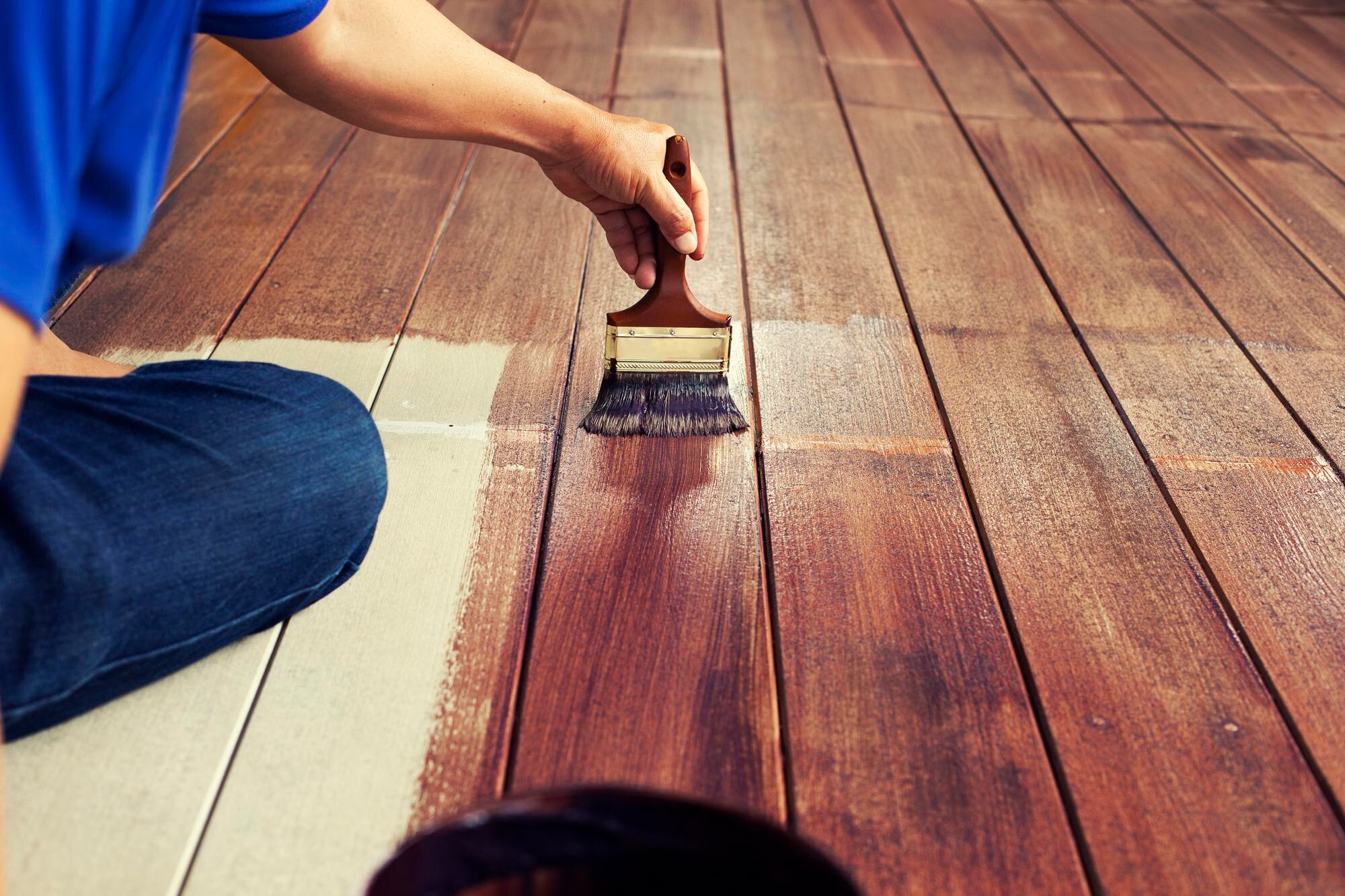 midsection of man painting hardwood floor 1af2c27fcdef12a327a7