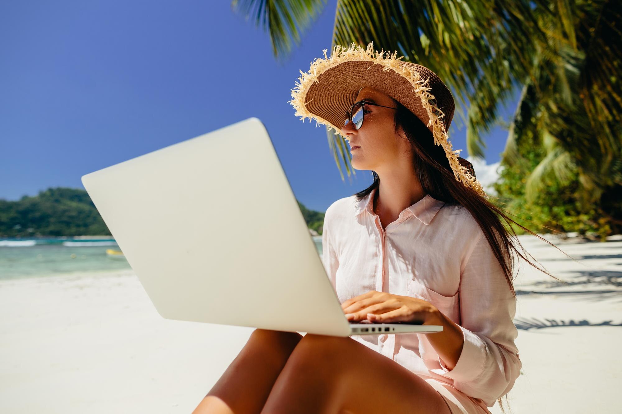 Embrace the Freedom: Mastering a Work-From-Anywhere Mindset 2 midsection of woman holding smart phone against sk 88f4249a6f4b285d84ec