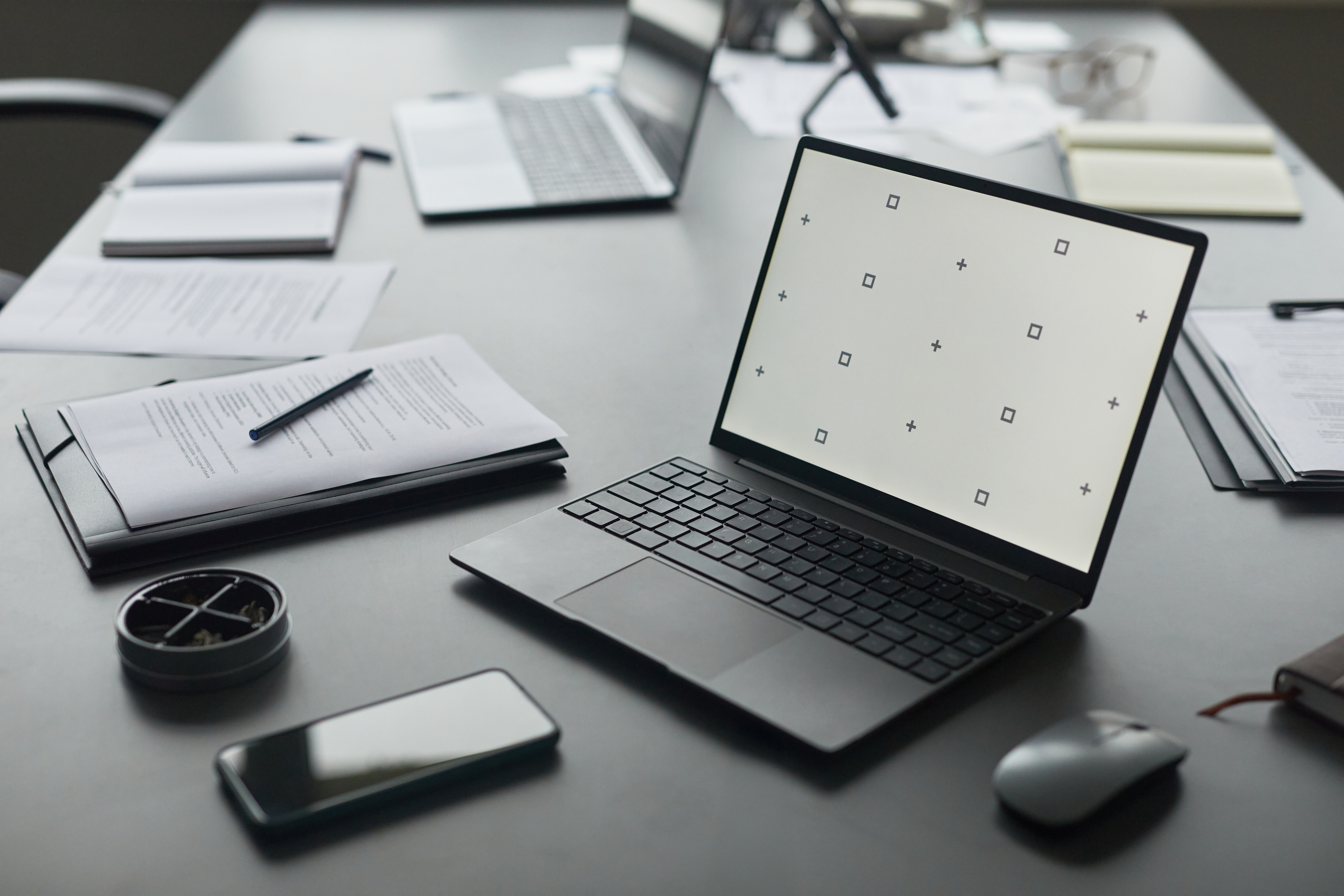 modern laptop displaying blank screen on office de b02521692ce20674b4eb