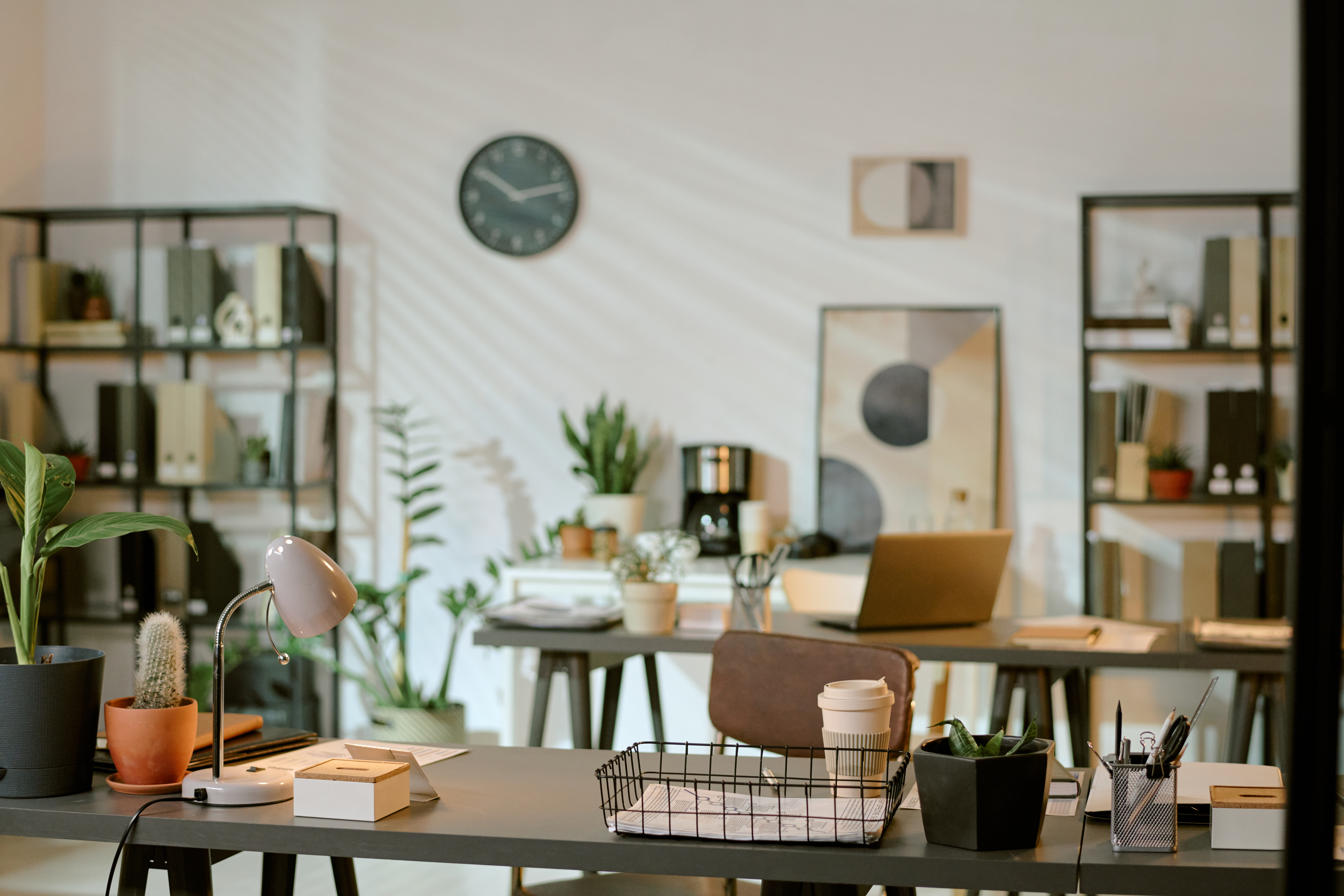 modern office workspace featuring laptops and indo 75b9fa0e9dfcbf024ea3