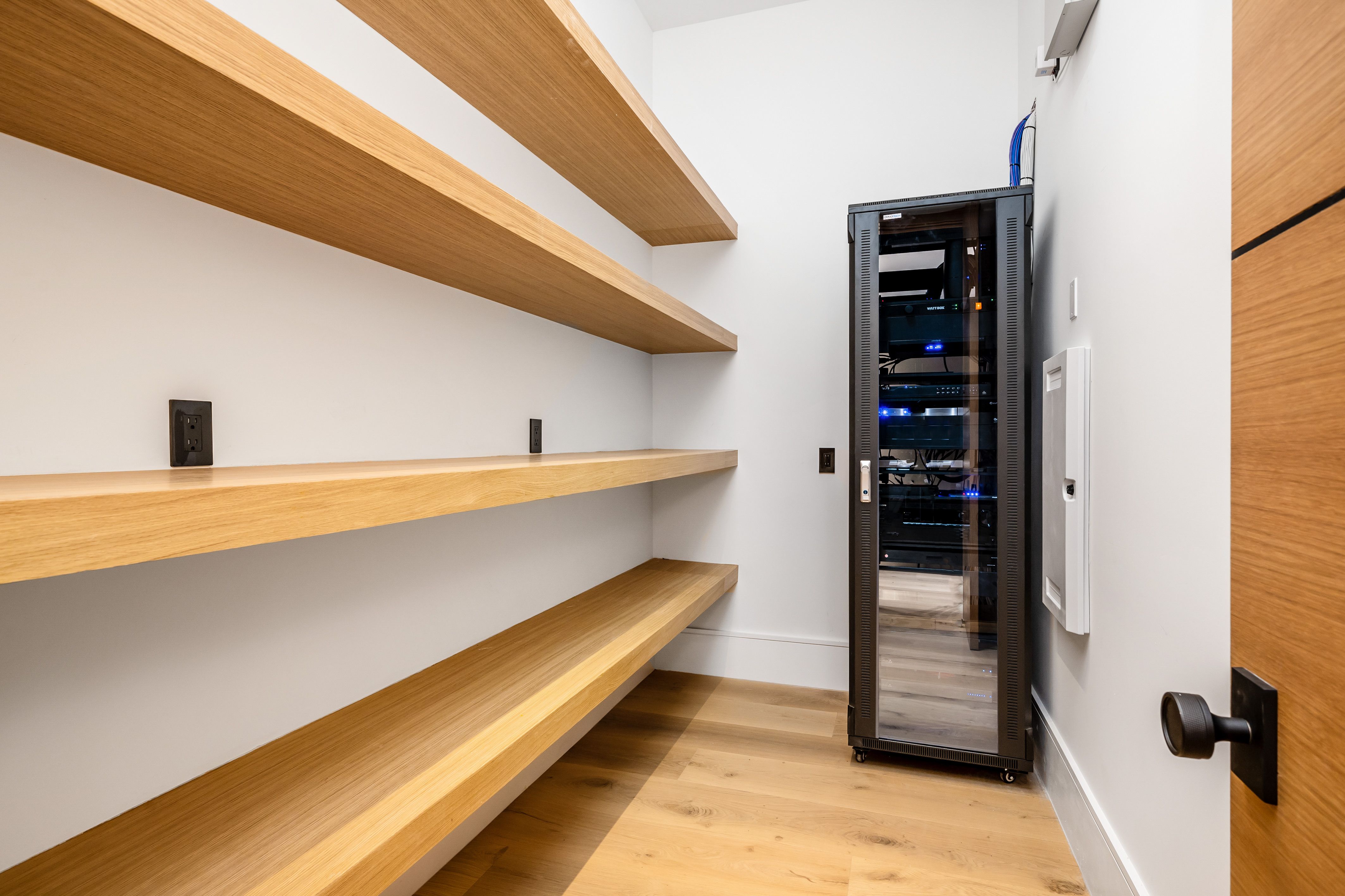 modern storage room with wooden shelves and server d8d9caf454ca1be2219f