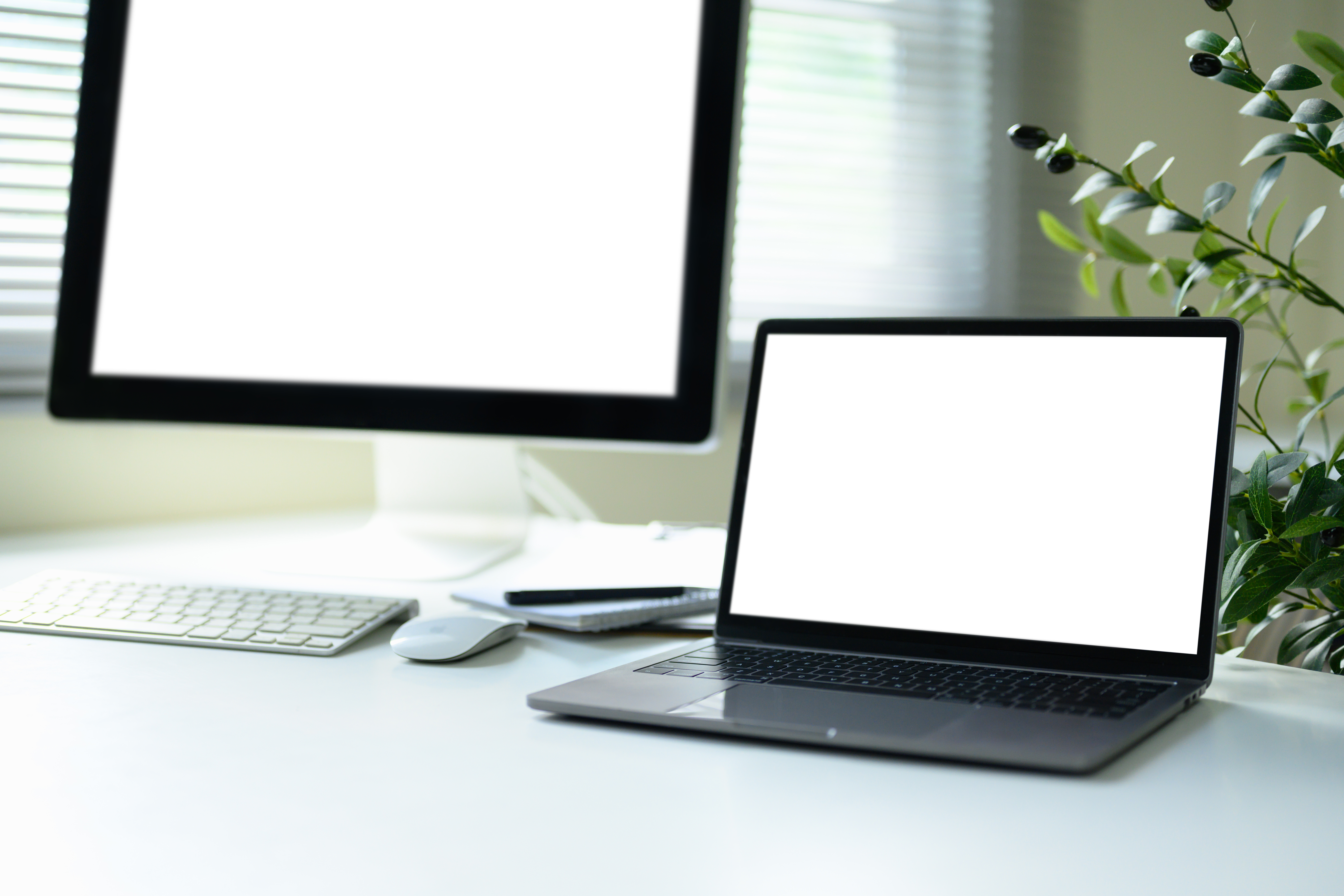 Modern White Desk With A Large Desktop Monitor And 1b8a9645bafe2393c428