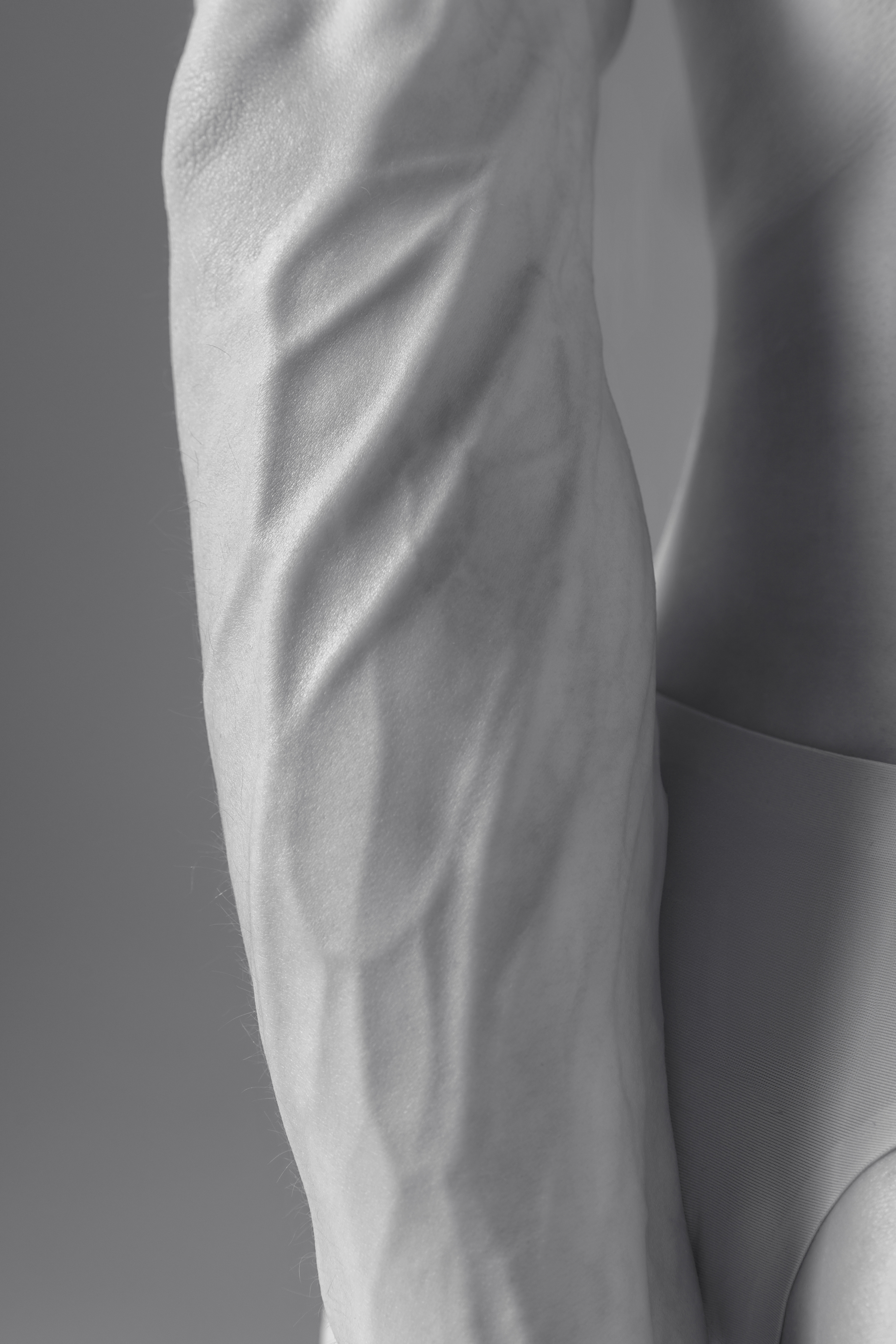 monochrome image of male muscular body essence of b36533bbf61a8362b077