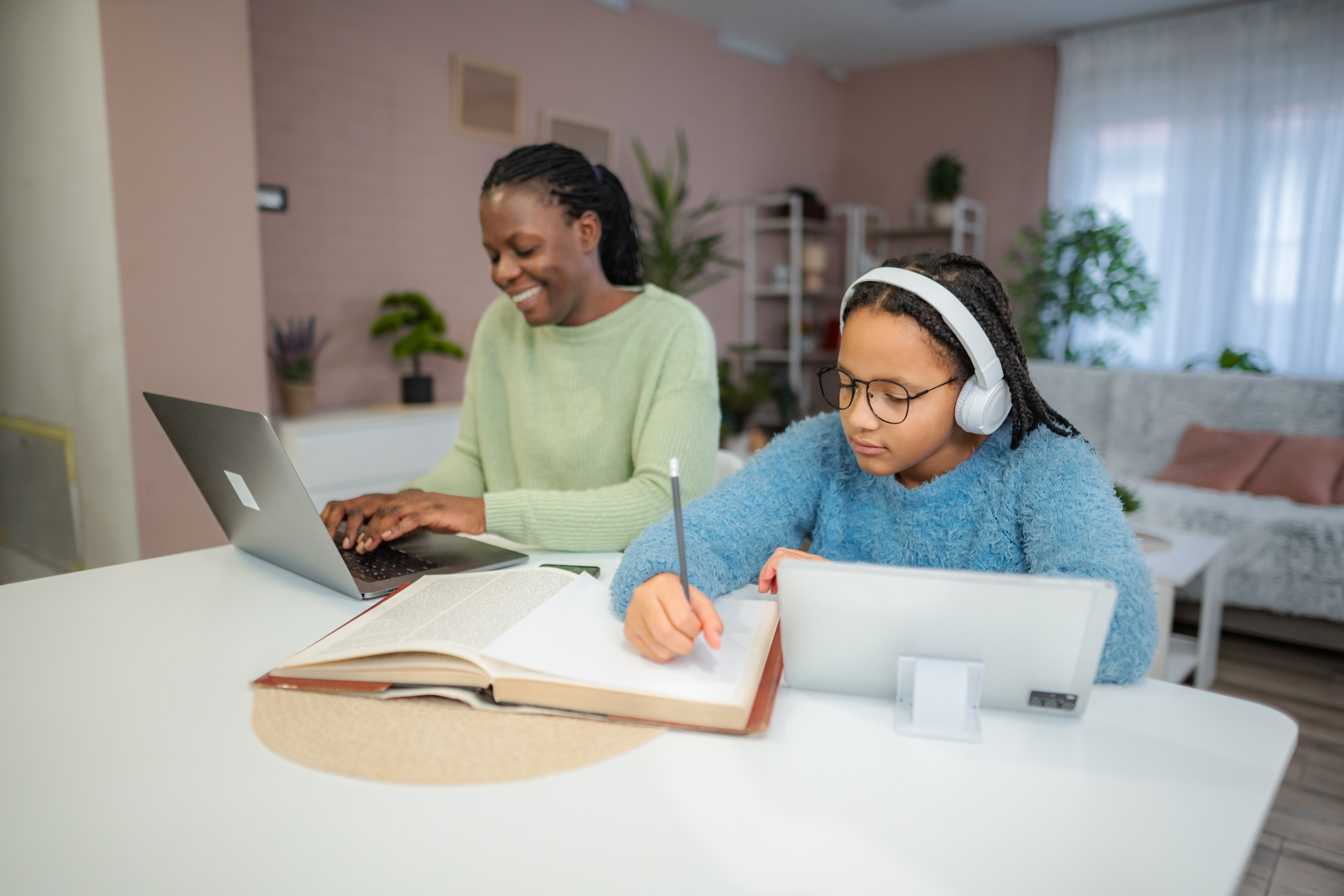 Mother And Daughter Studying Online And Working Fr A6be5b3aa8bf094feaaa