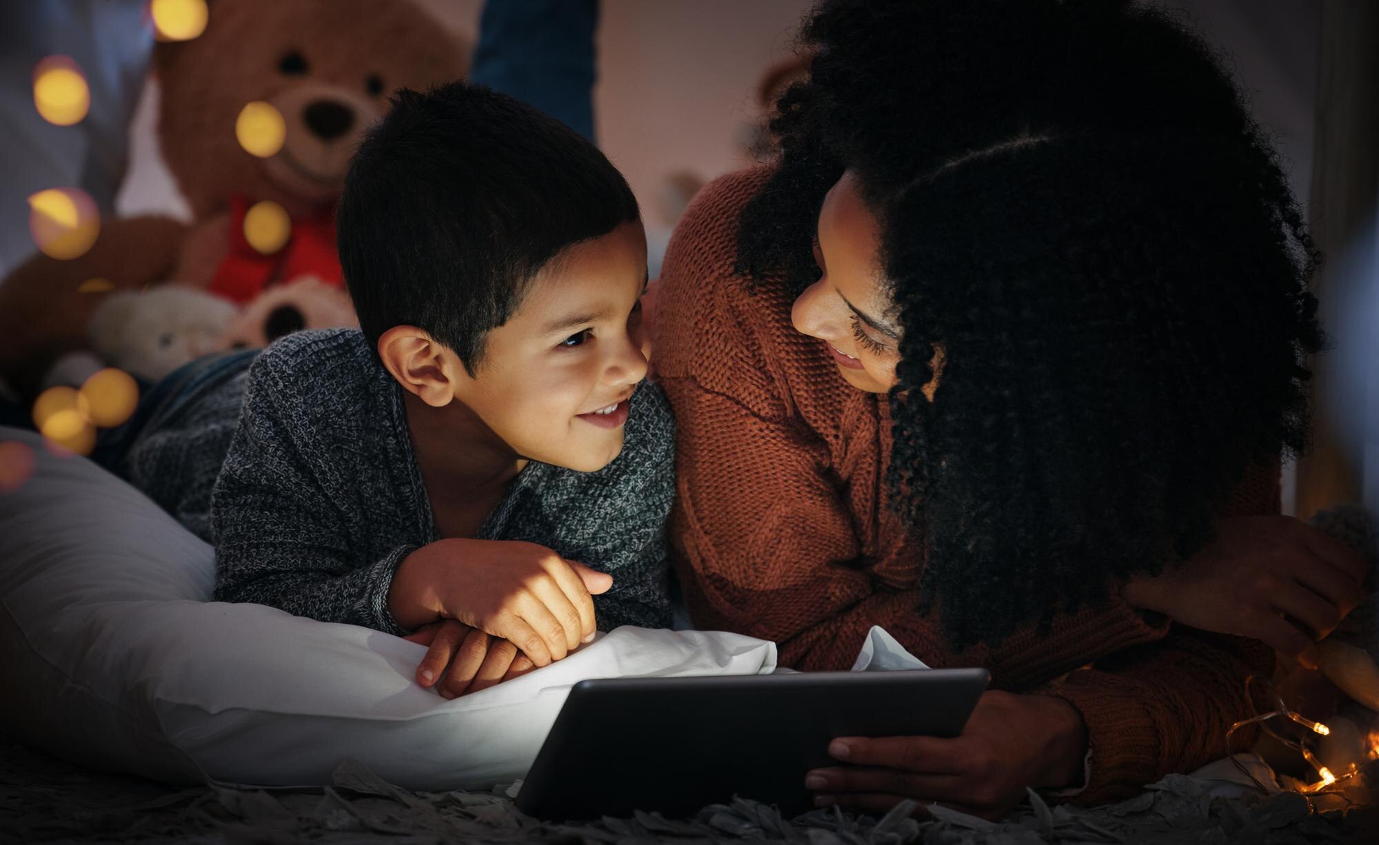 Mother Son And Tablet On Bed In Night With Smile S 20718c6c39b8d4b4d00b
