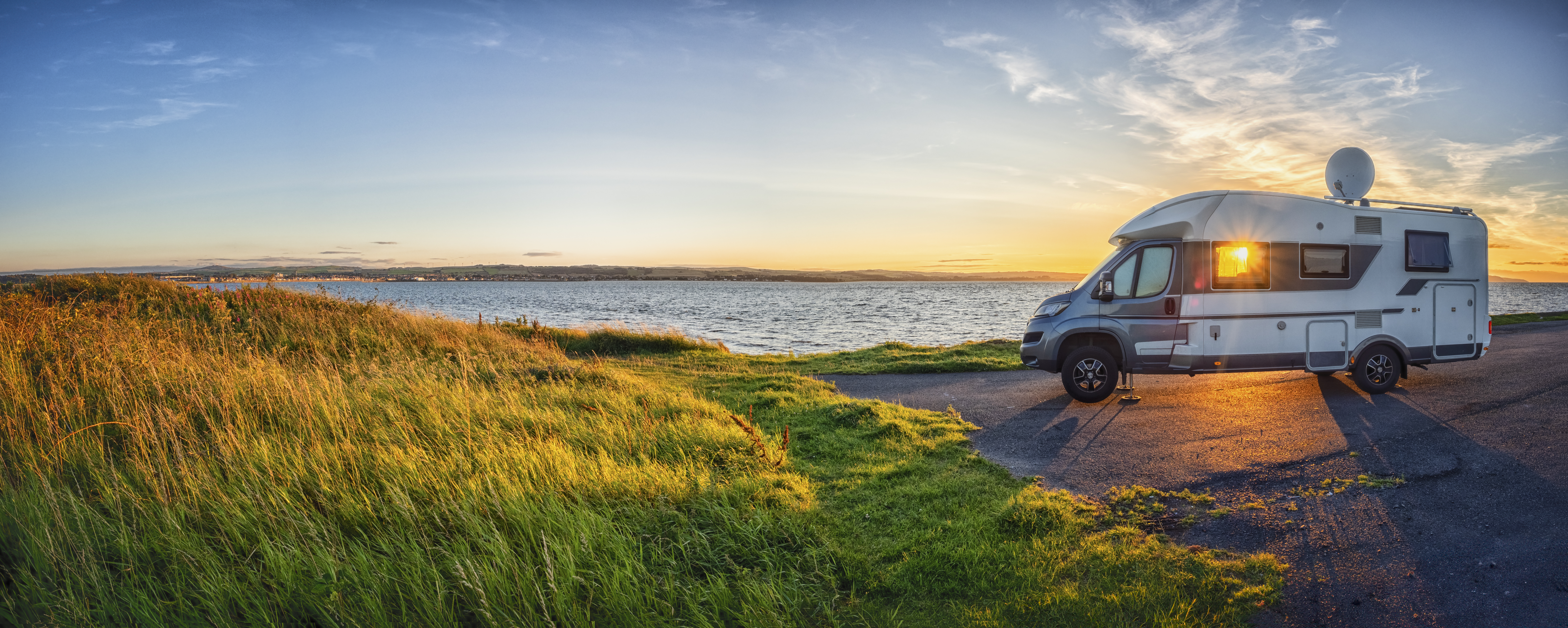 motorhome at loch ryan during sunset 7548aa1b1f10f247e9fa BTOURS