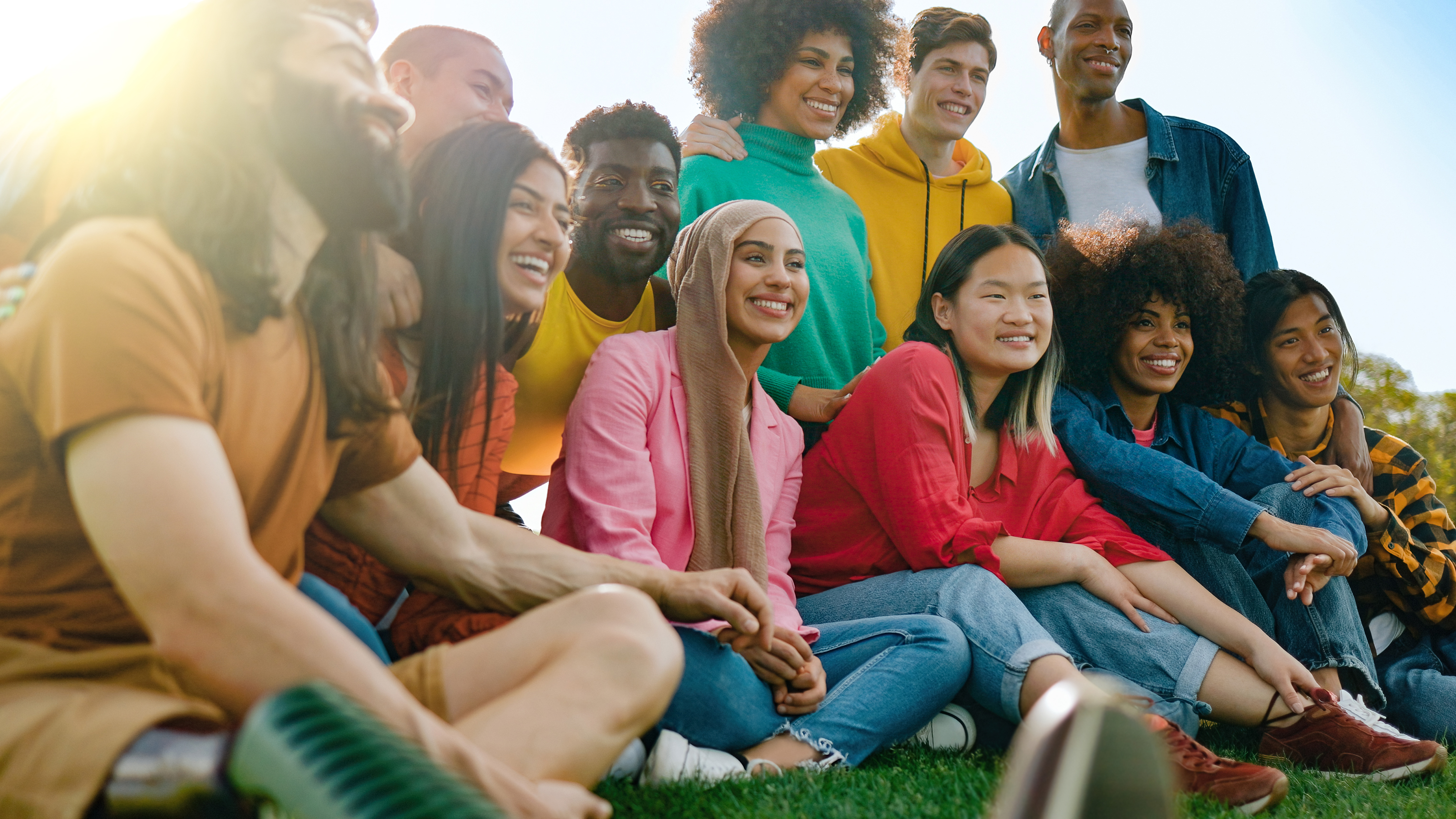 multicultural group of friends having fun outdoors e963b38a915a0aaaa7f1