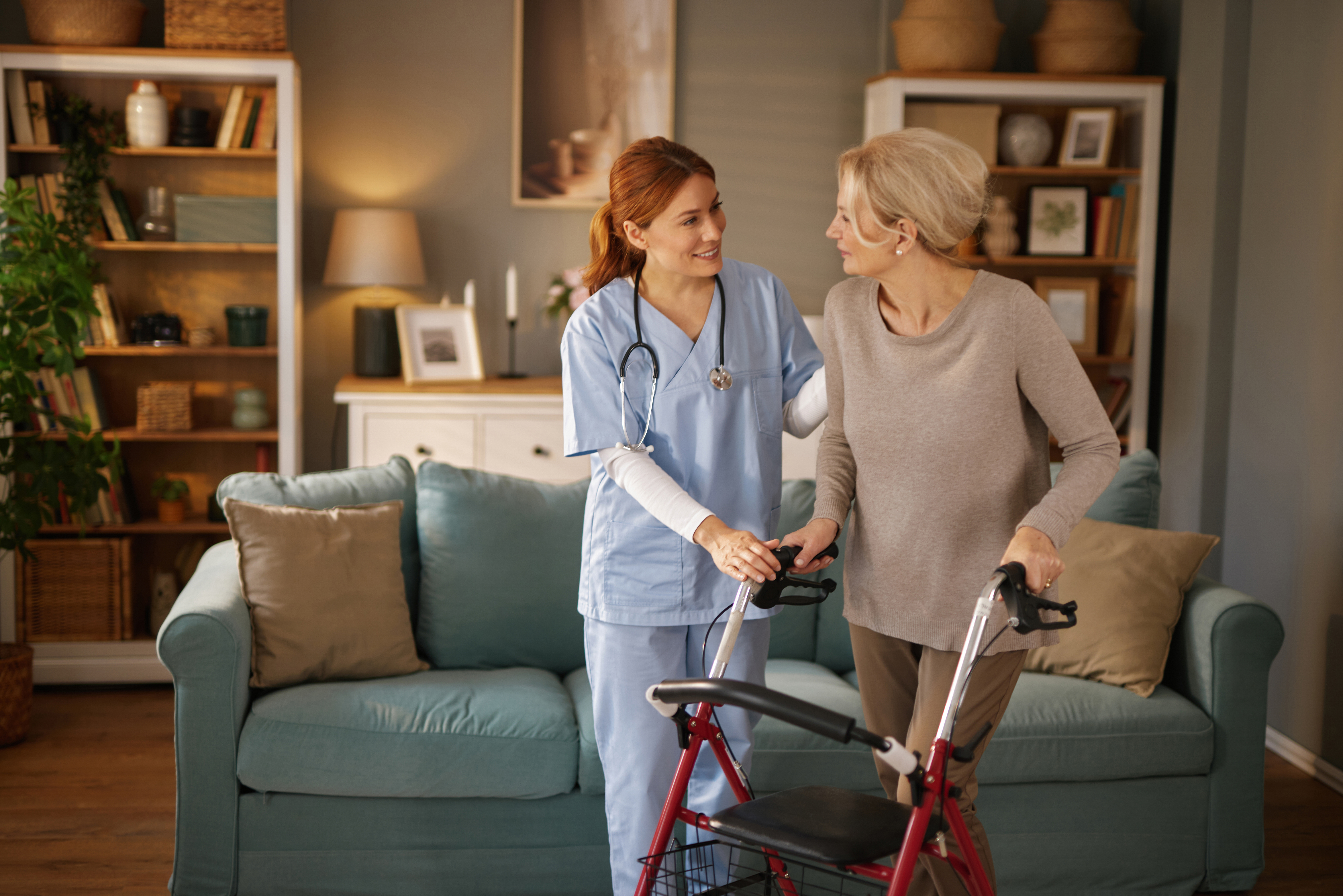 nurse assisting elderly woman using walker in livi 3ba4c5bf8fce9bb0d0ce