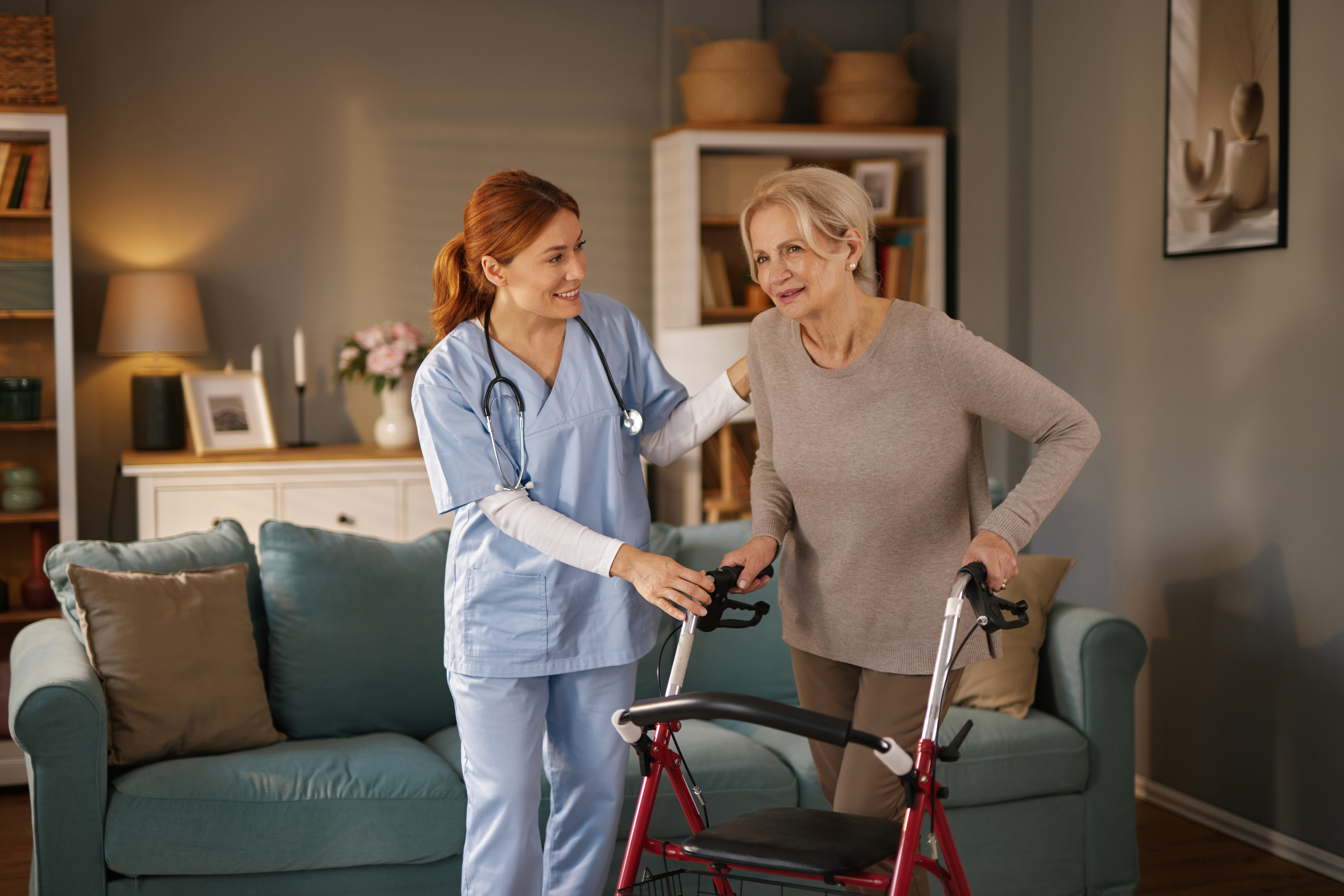 nurse assisting elderly woman using walker in livi b7597a319e7550848b75