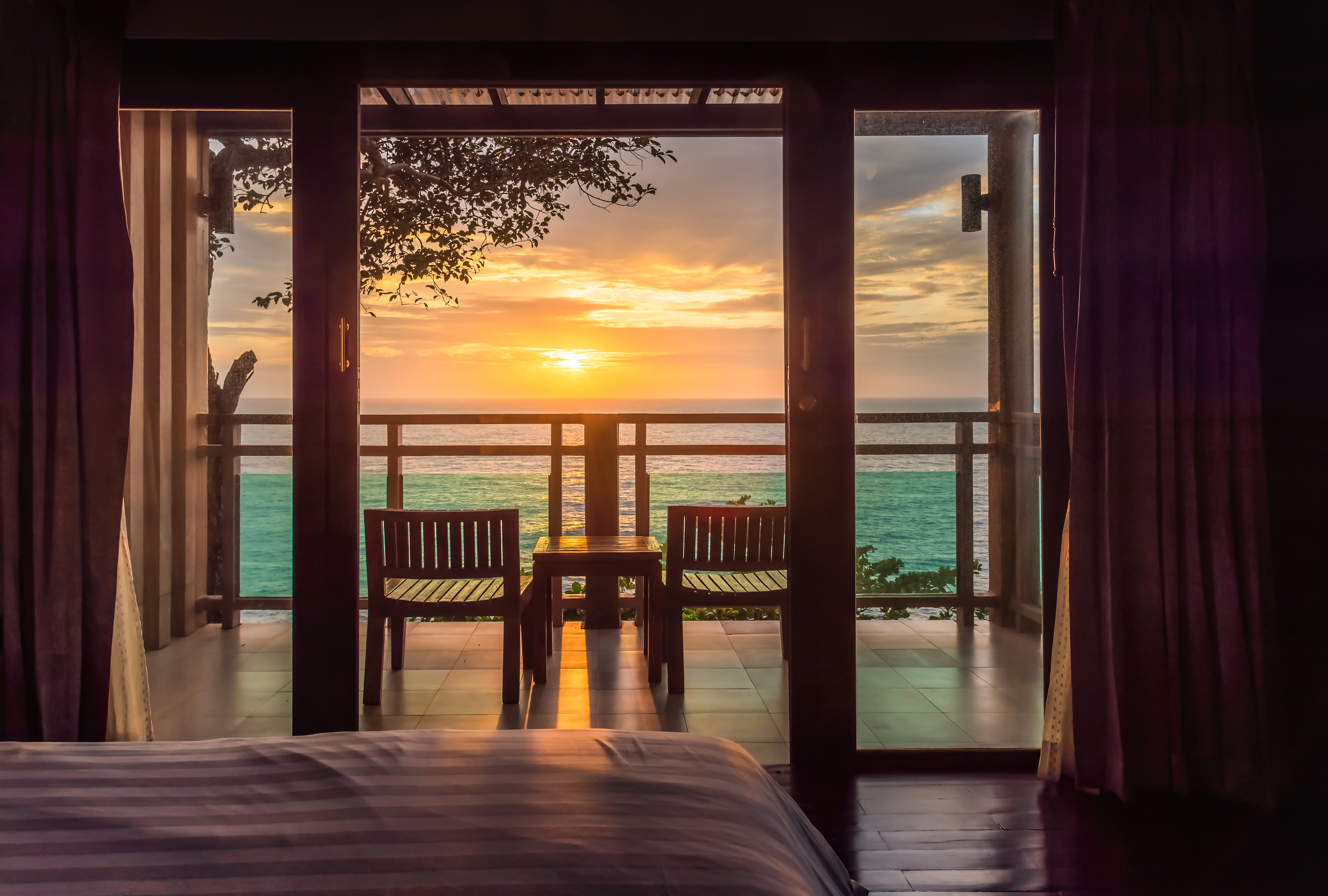 ocean sunset view from bedroom balcony for travel b9722da87d88a8f025ee BTOURS
