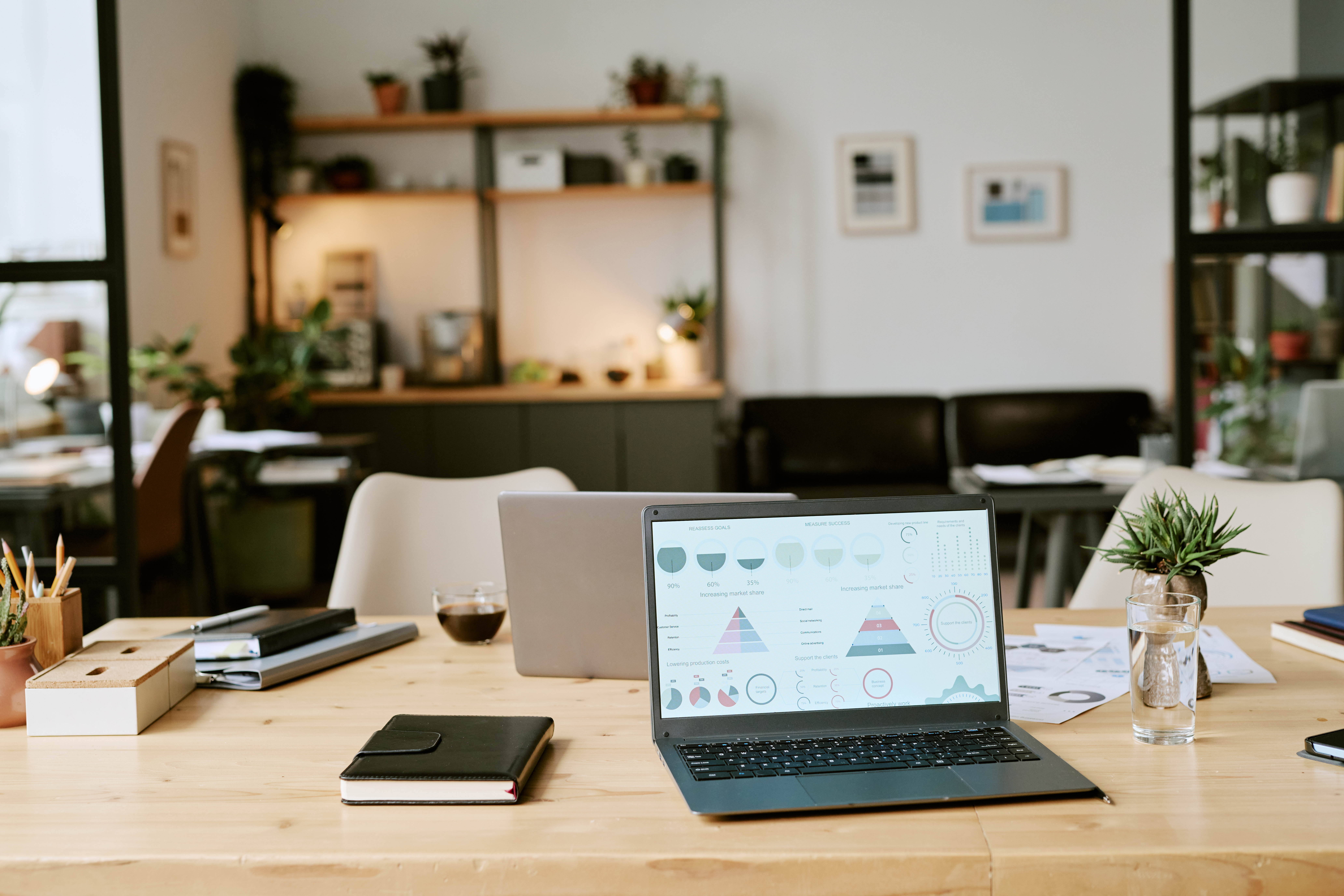 open workspace featuring laptop showing data visua a7eaa5af5e7f959afb18