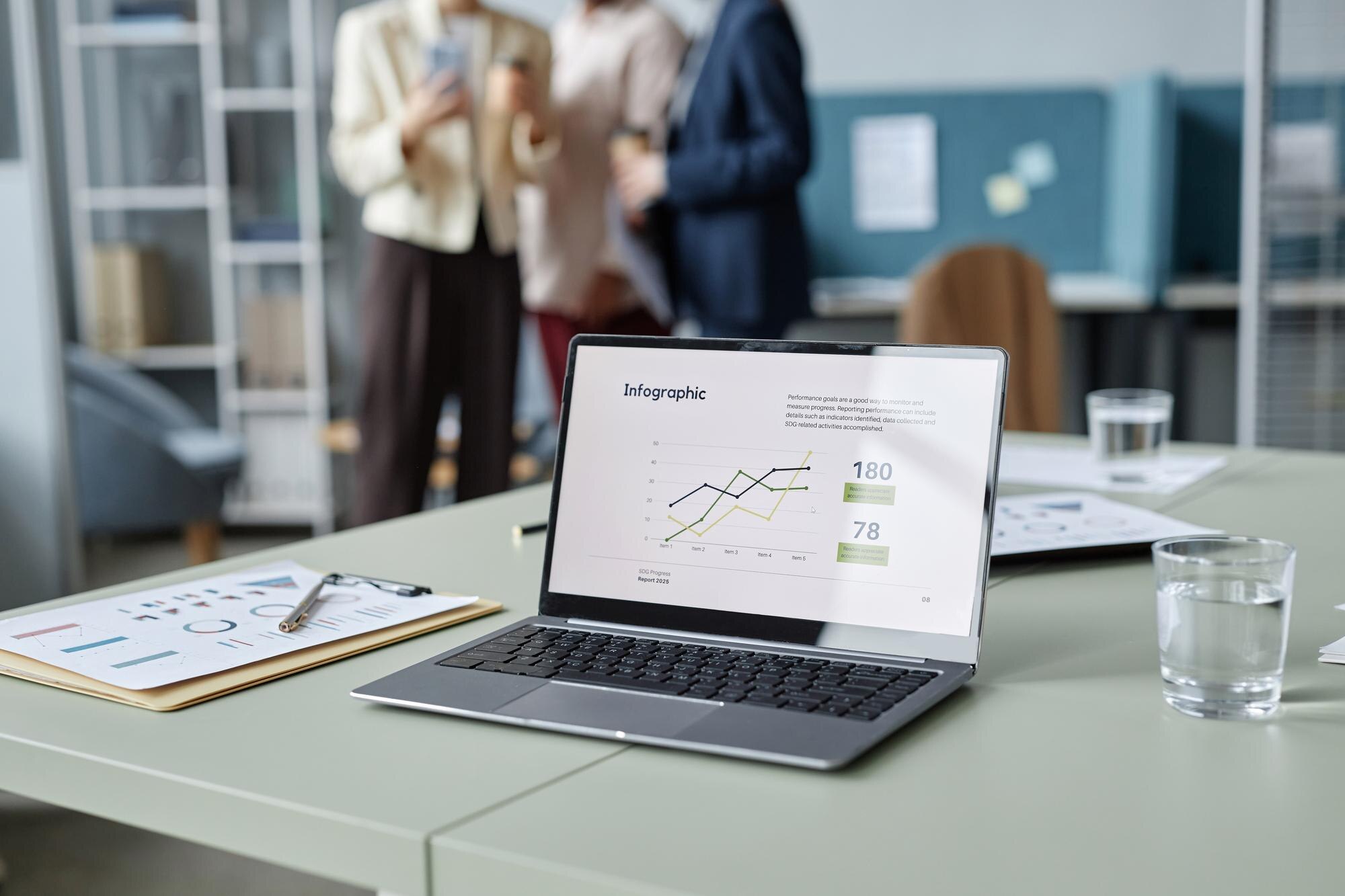 Is Google Ads Truly Working for Your Business? 2 operating laptop on office table with business rep d9a66126a3ef5656f6c9