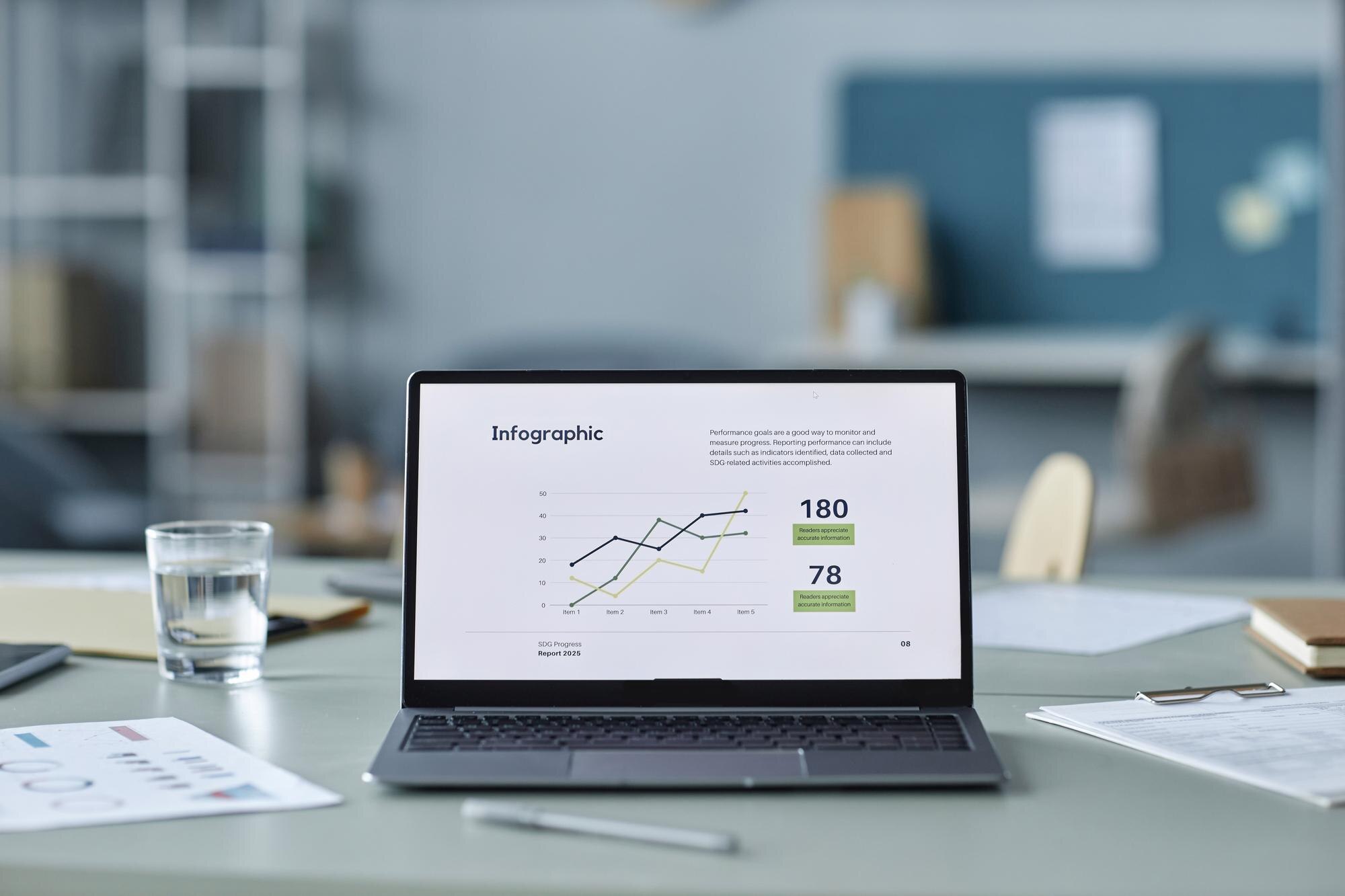 operating laptop with business report on screen 25dbb0879c09f858cff6