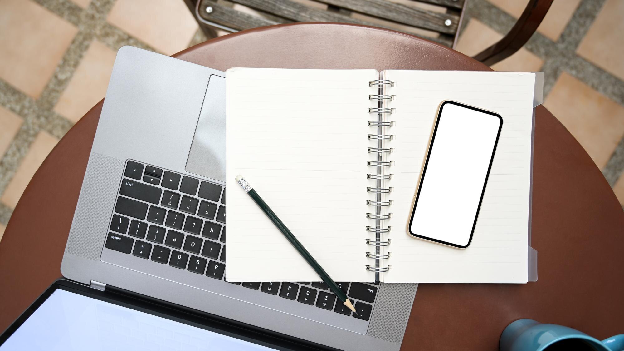 overhead shot of a workspace with laptop computer 6f633333018852cc4211