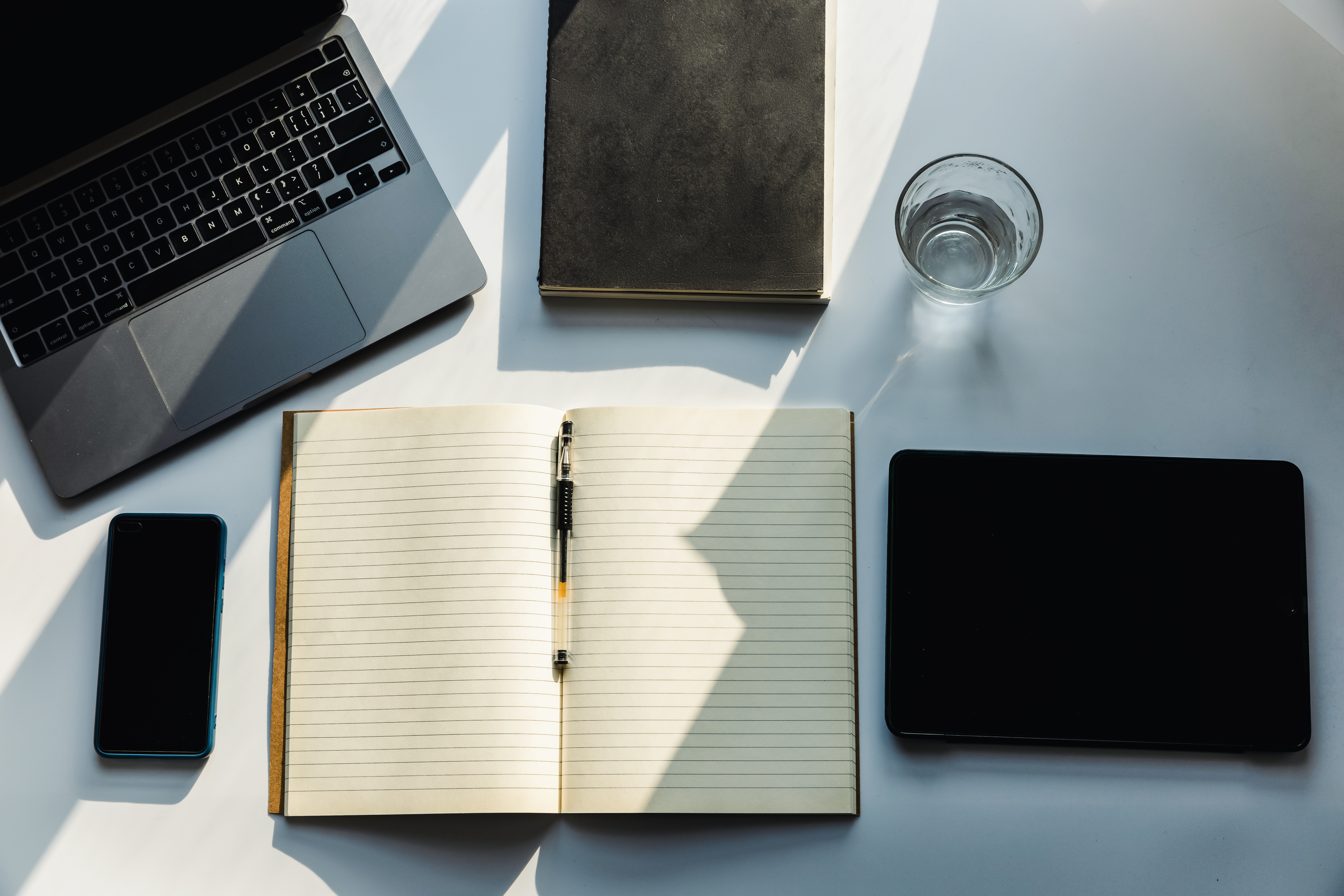overhead view of workspace with laptop digital ta c81bc3d94a65c0e4ef85