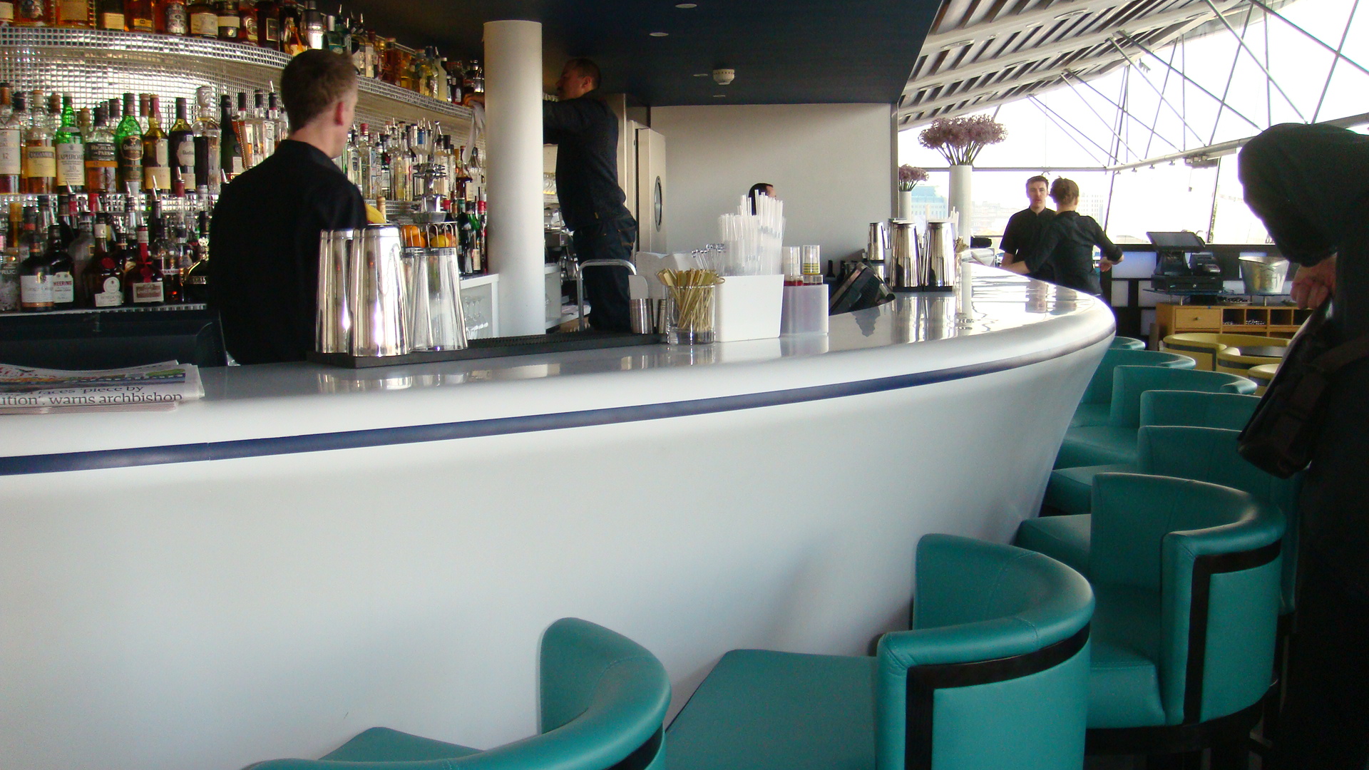 Thermoformed and Curved bar made from Corian Solid Surface in Hospitality Design