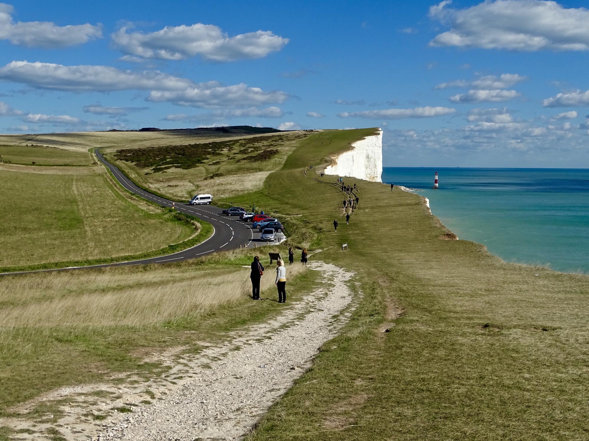 people on road by sea against sky 8cbeb7548d4e49d9dbed BTOURS