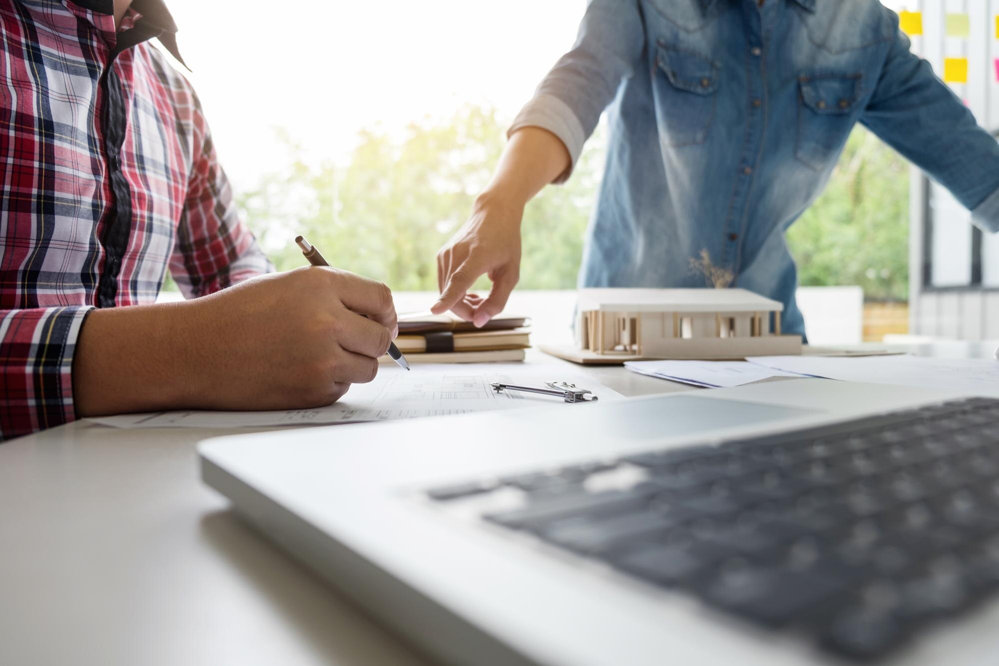 Ordering Plastics for Your Next Home Project: What to Know Before You Buy 2 people working on table 1fb882d7408887ee71a7
