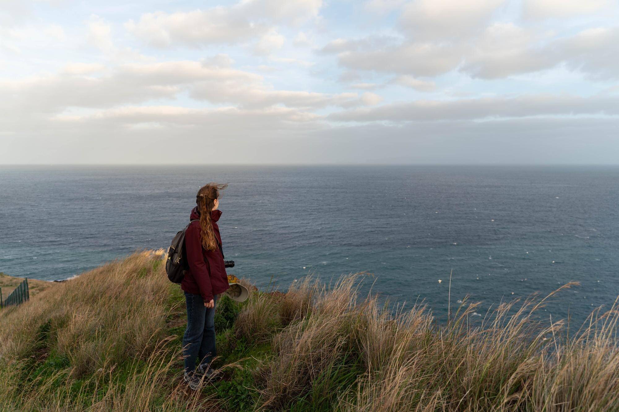 Spring 2026 Self‑Drive: The Most Scenic Routes Across England, Scotland and Wales 5 person on cliff edge looking at the ocean 2a51ab8bea876408264d BTOURS
