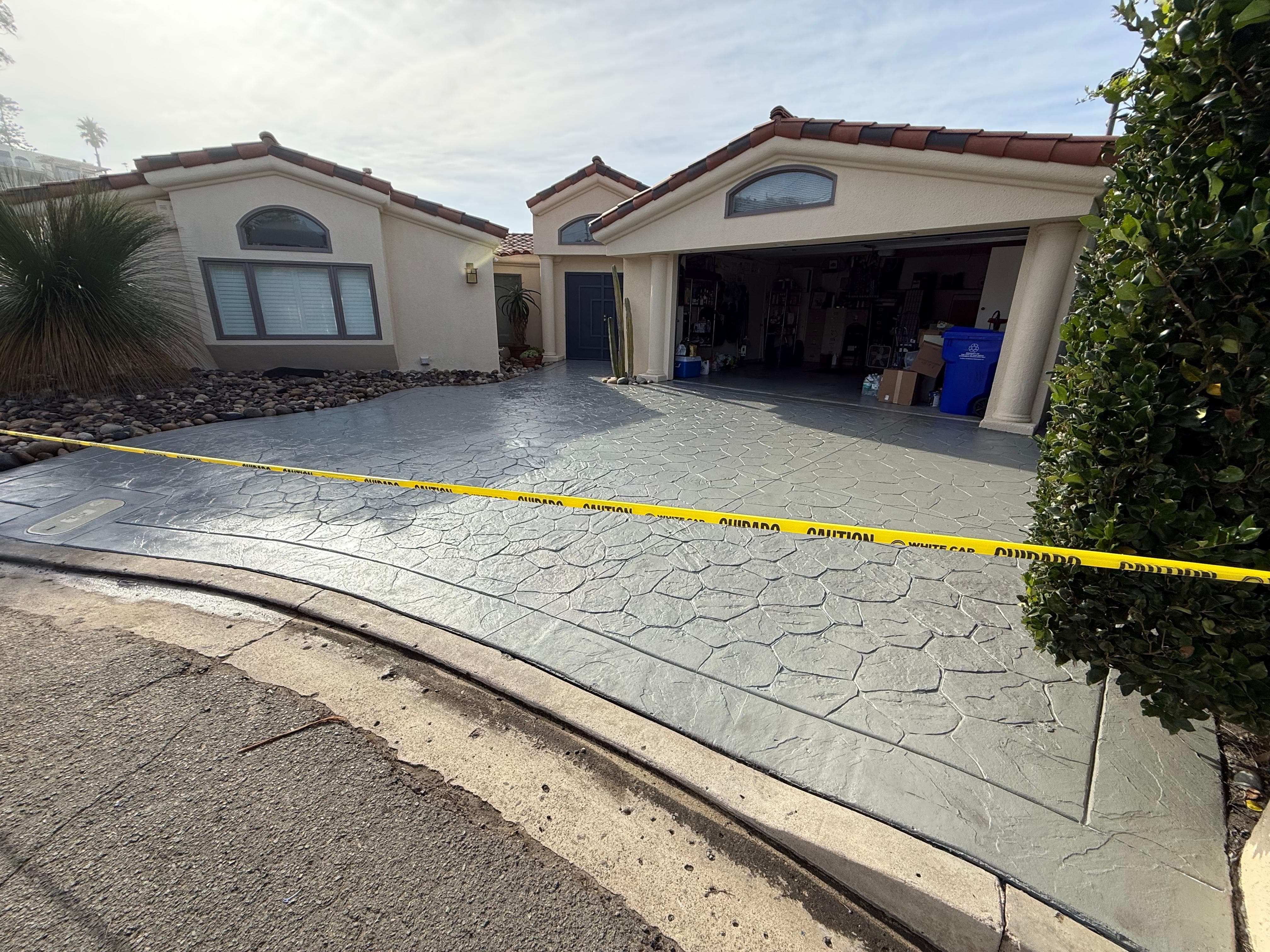 alt="concrete driveway staining and sealing services in San Diego"