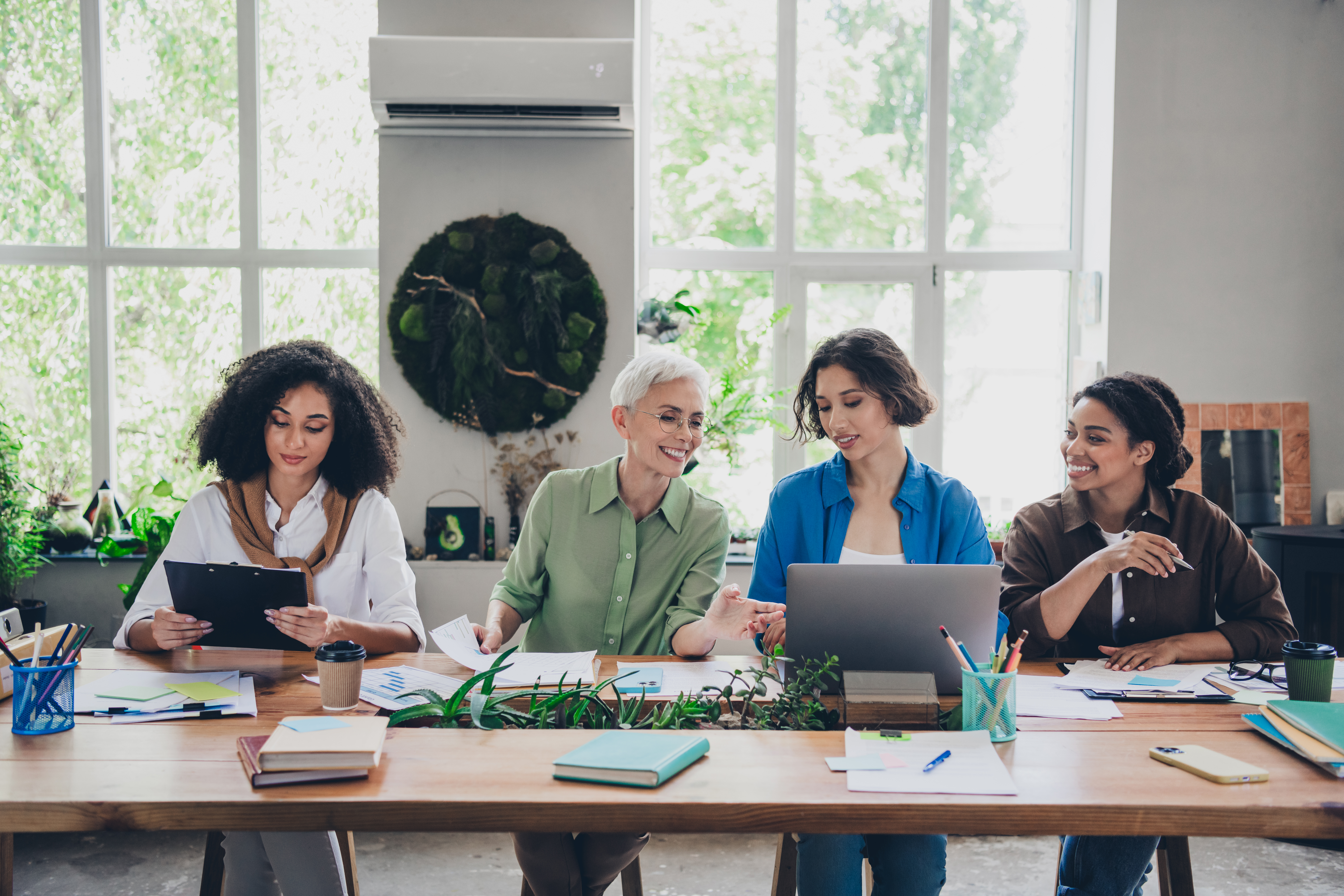 Essential Digital Tools for Every Travel Entrepreneur in 2025 3 photo of four diverse women businessladies feminis db47c707342ba4d63944