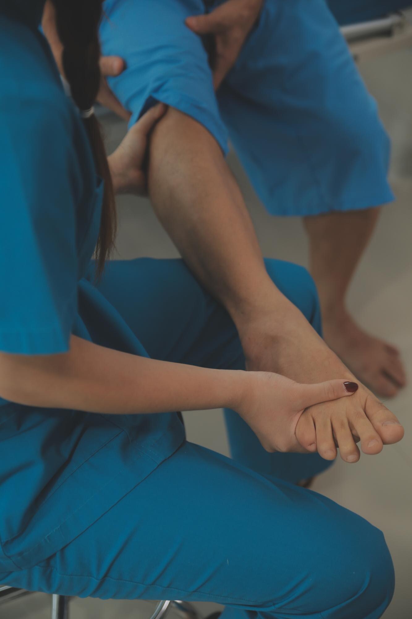 physical therapists work with patients in closeup f4723d663f19cf0871e8