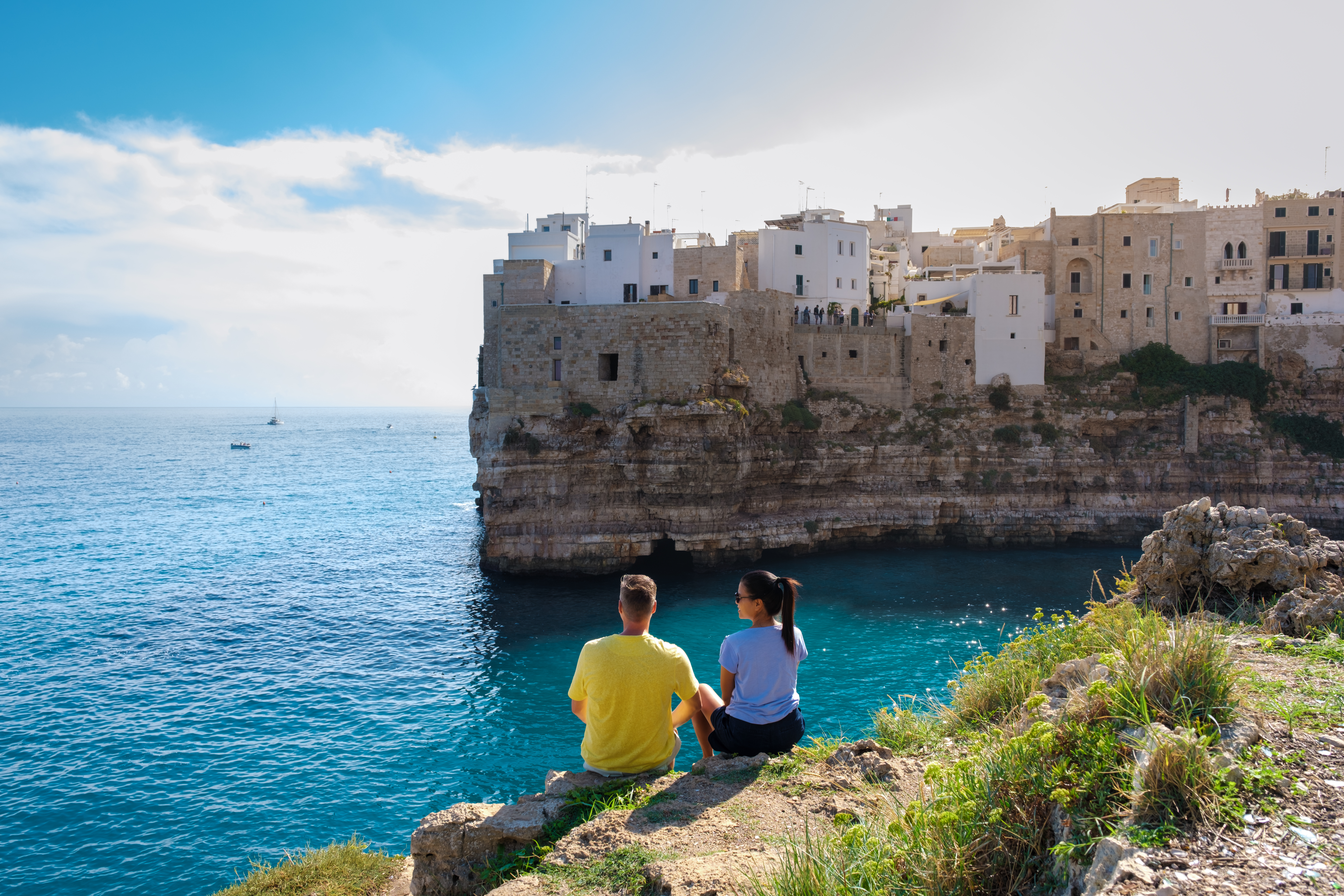 polignano a mare a couple enjoying a serene moment efa99345e4b7cbb9331c BTOURS